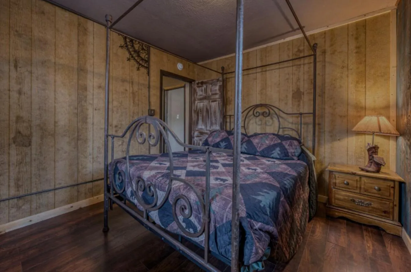 Bed in Enchanted Hideaway Cabins and Cottages