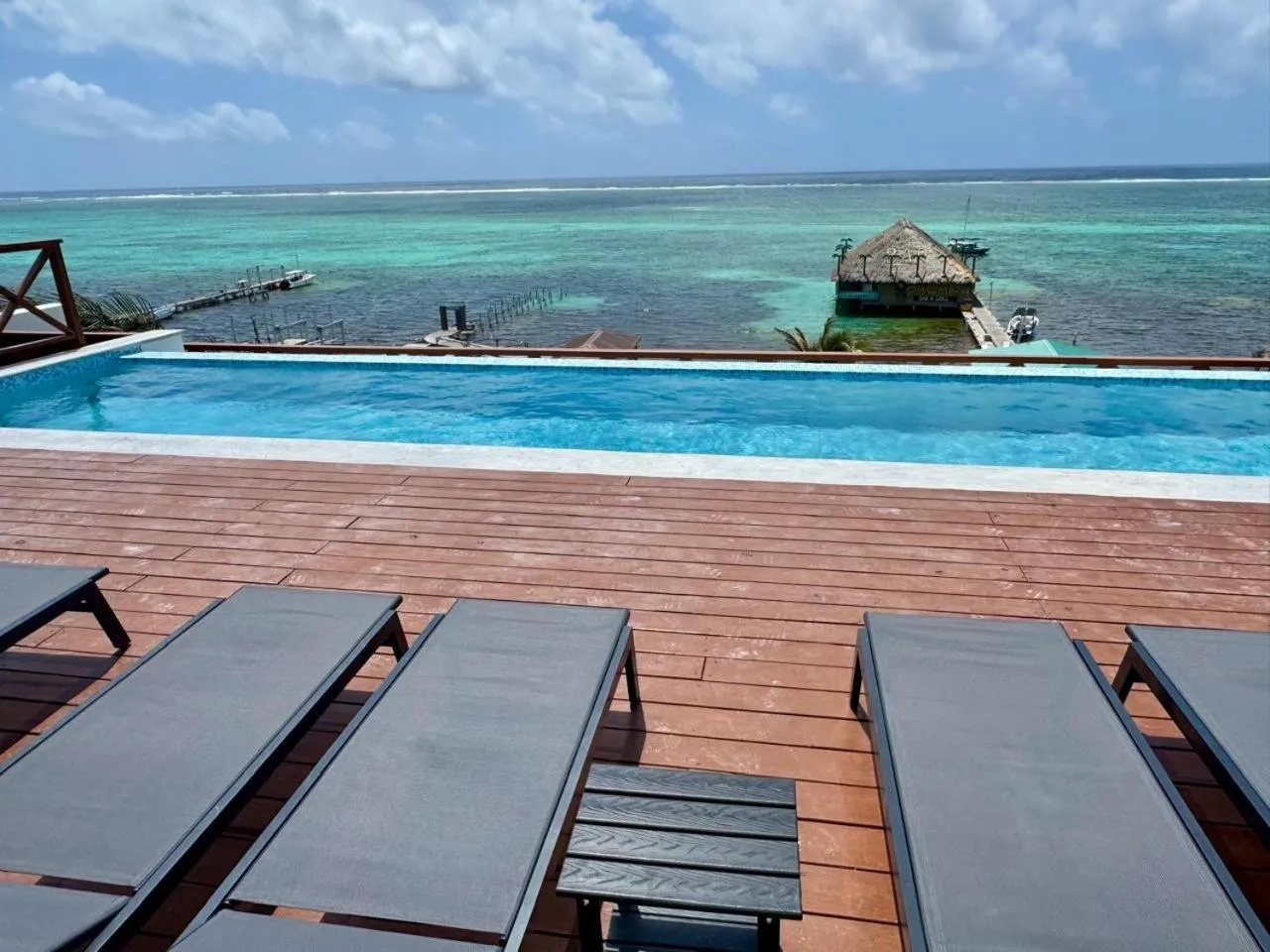 Swimming pool in Sandbar Beachfront Hotel & Hostel Restaurant