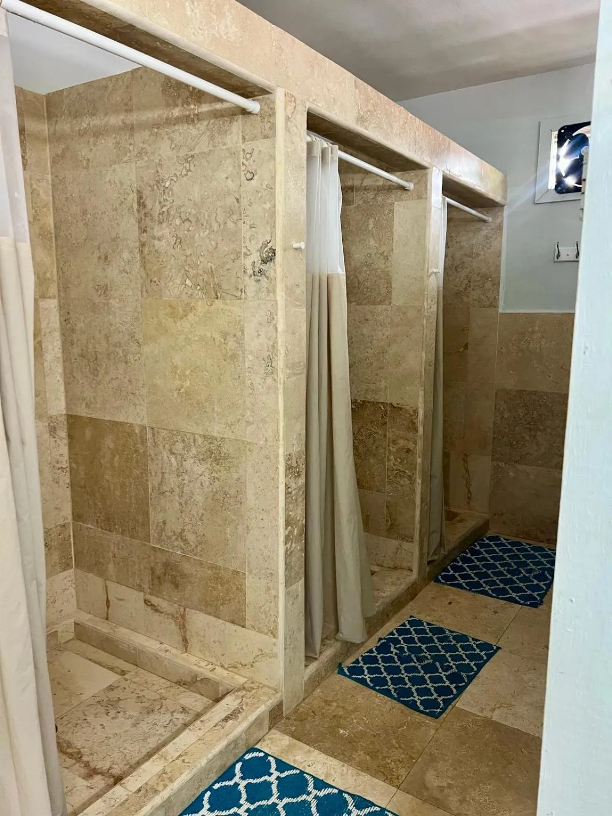 Bathroom in Sandbar Beachfront Hotel & Hostel Restaurant