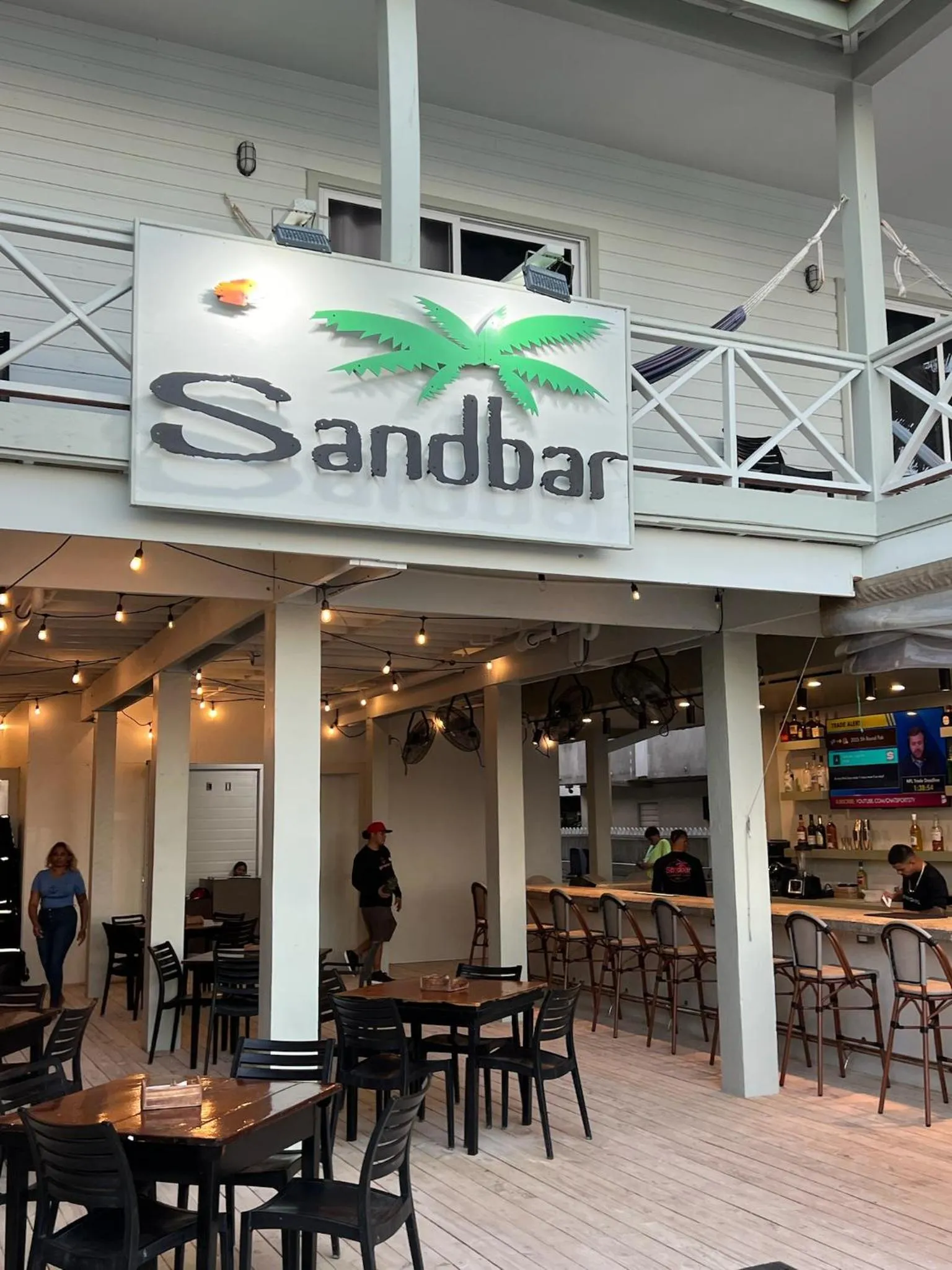 Property building in Sandbar Beachfront Hotel & Hostel Restaurant