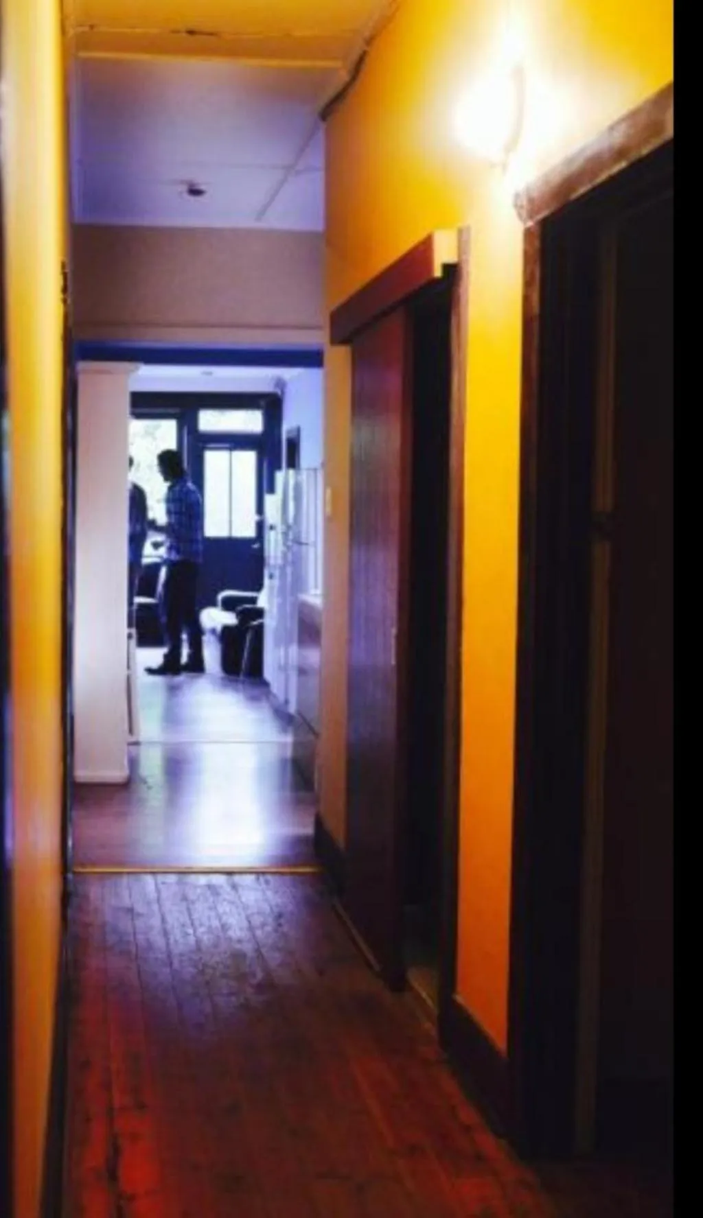 Communal lounge/ TV room in St Kilda East backpackers' hostel