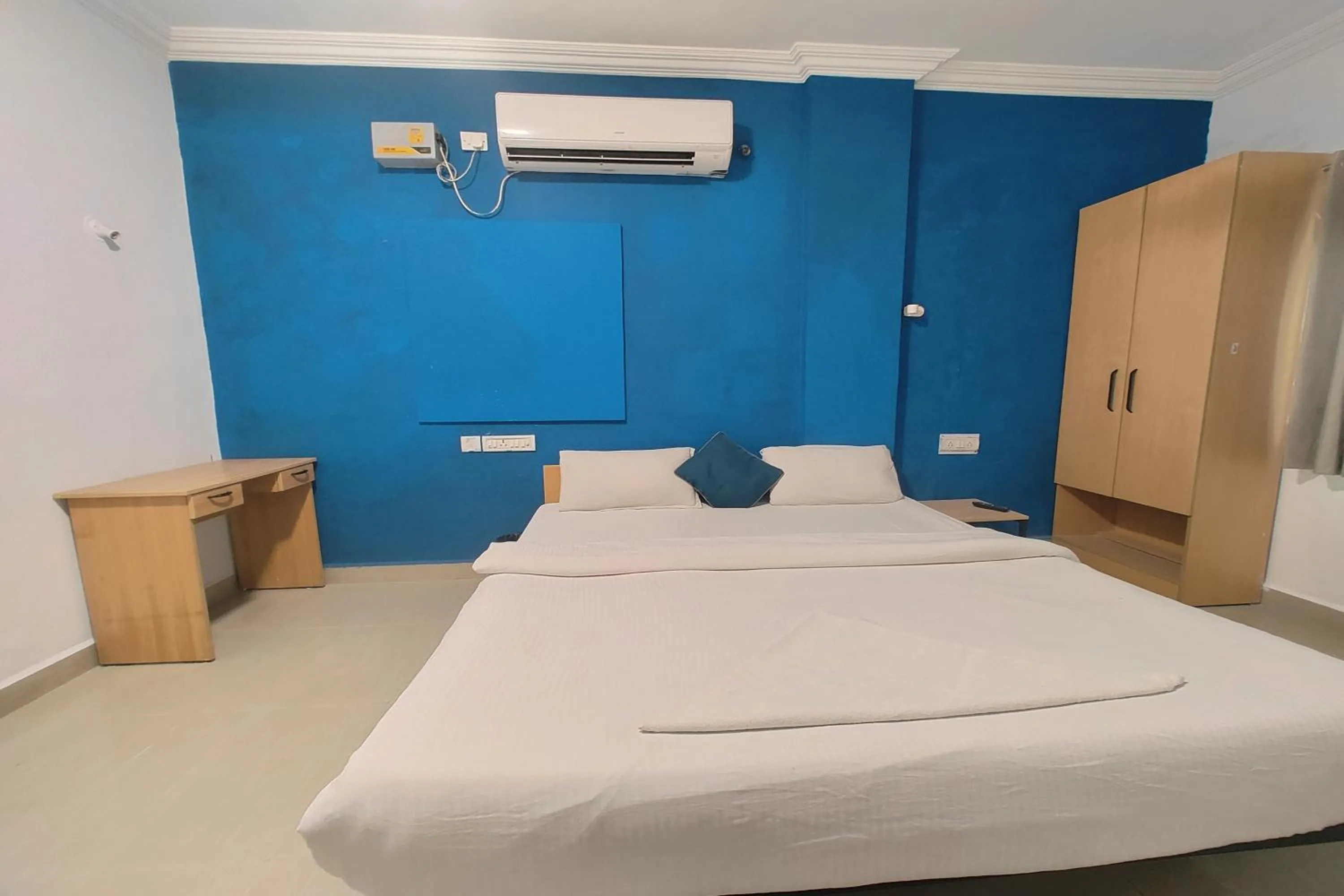 Bed in Hotel Sai Inn Executive