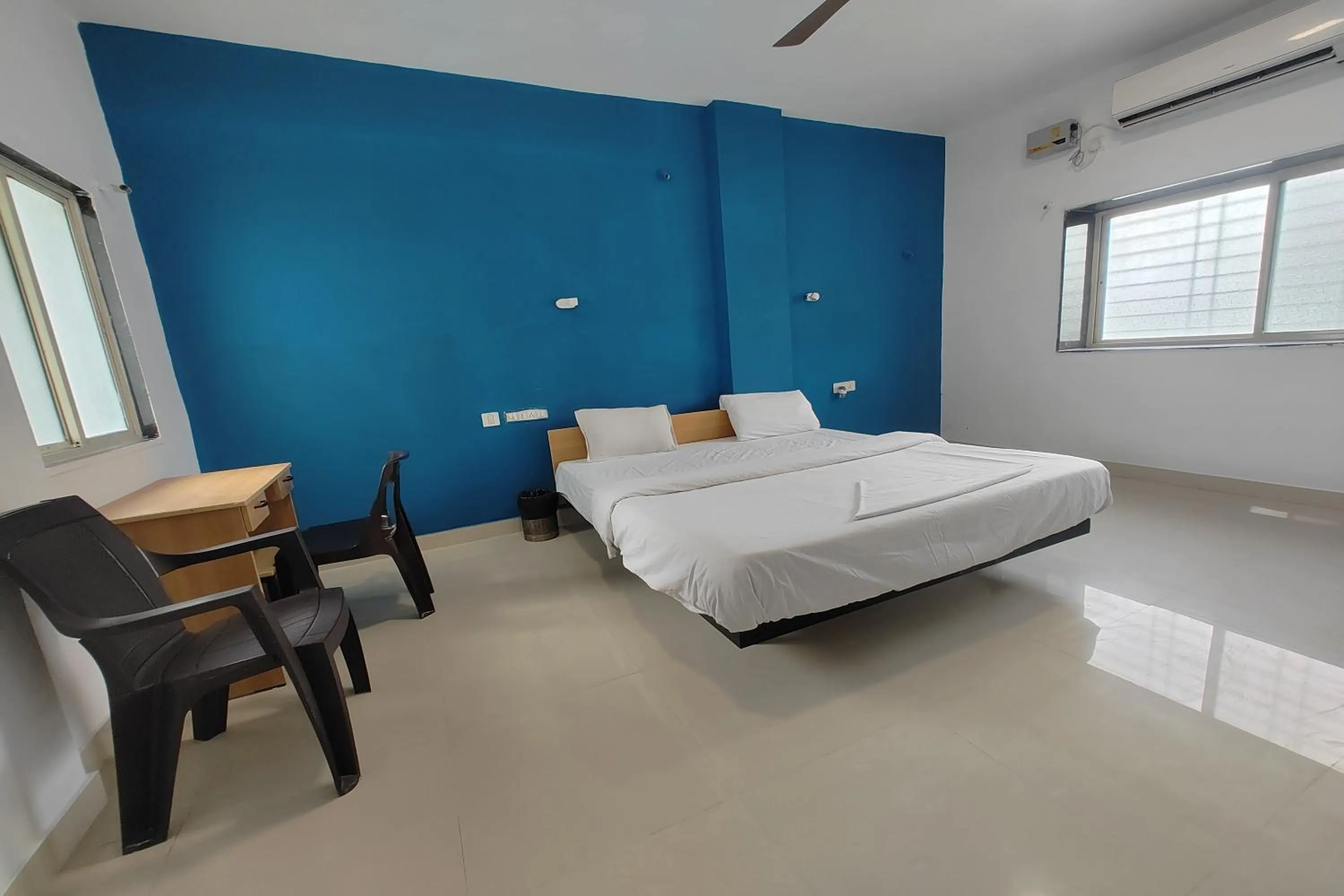 Bed in Hotel Sai Inn Executive