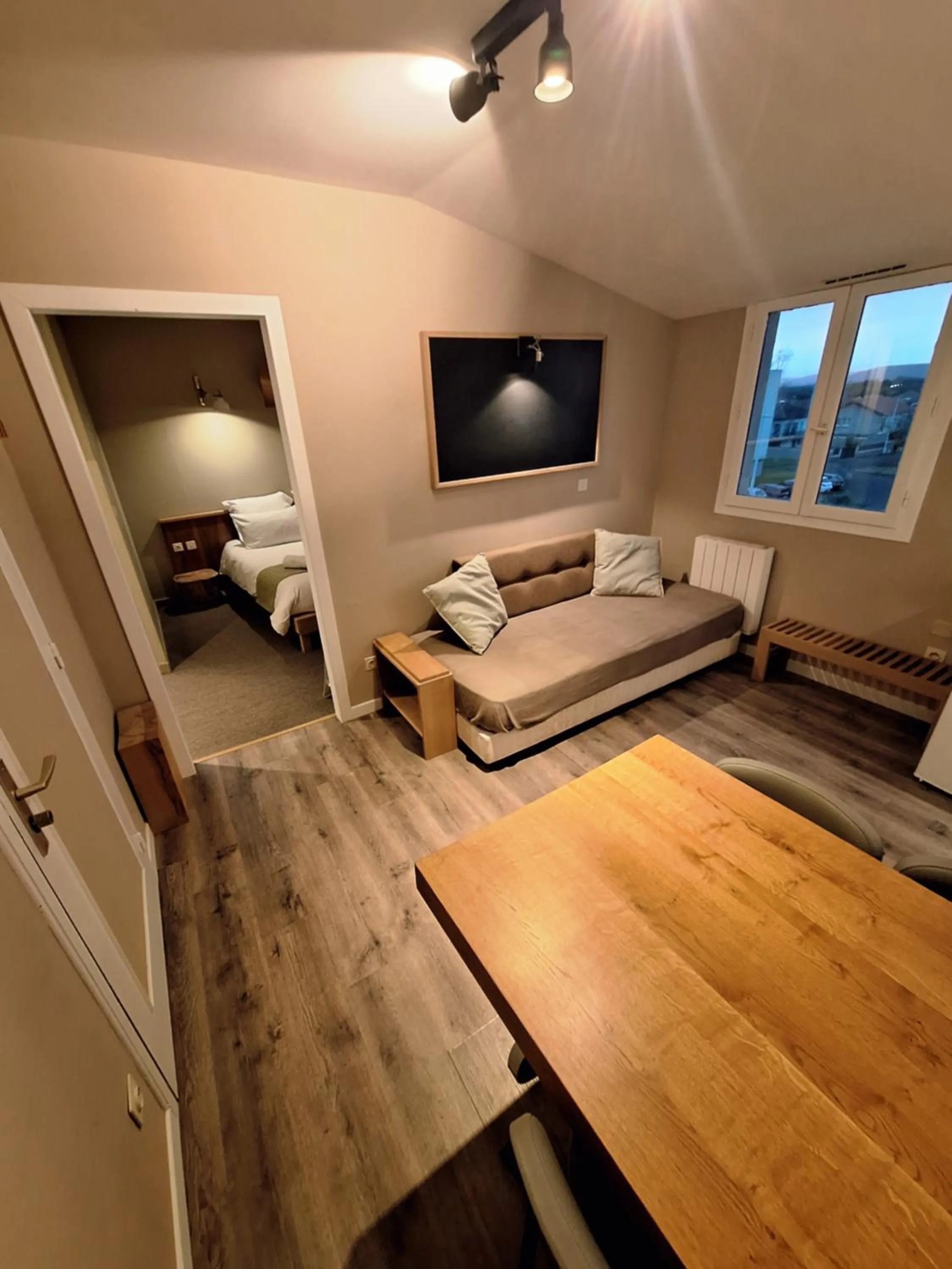 Seating area, Bed in Résidence L'Atelier