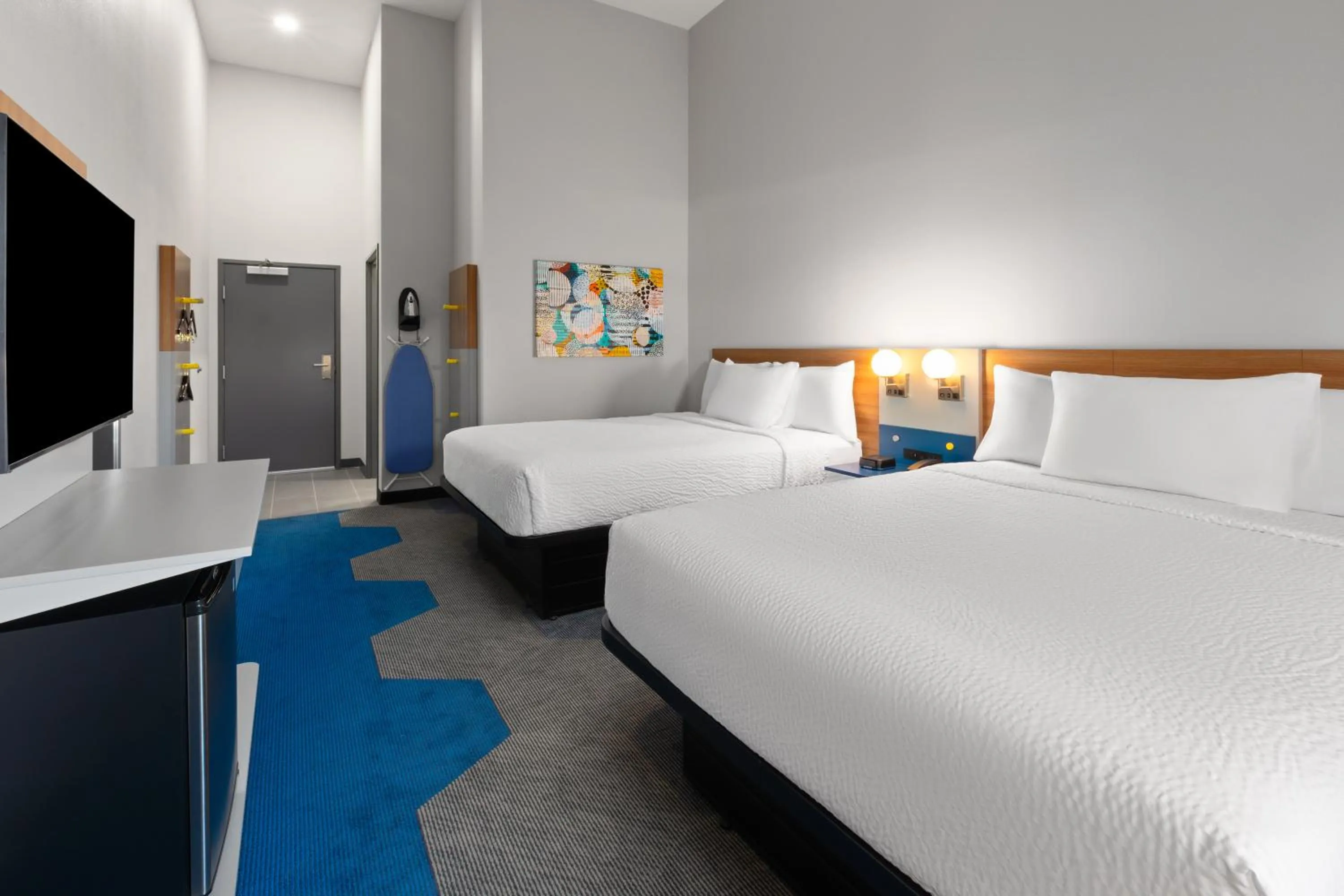 Bed in Microtel Inn & Suites by Wyndham Olive Branch