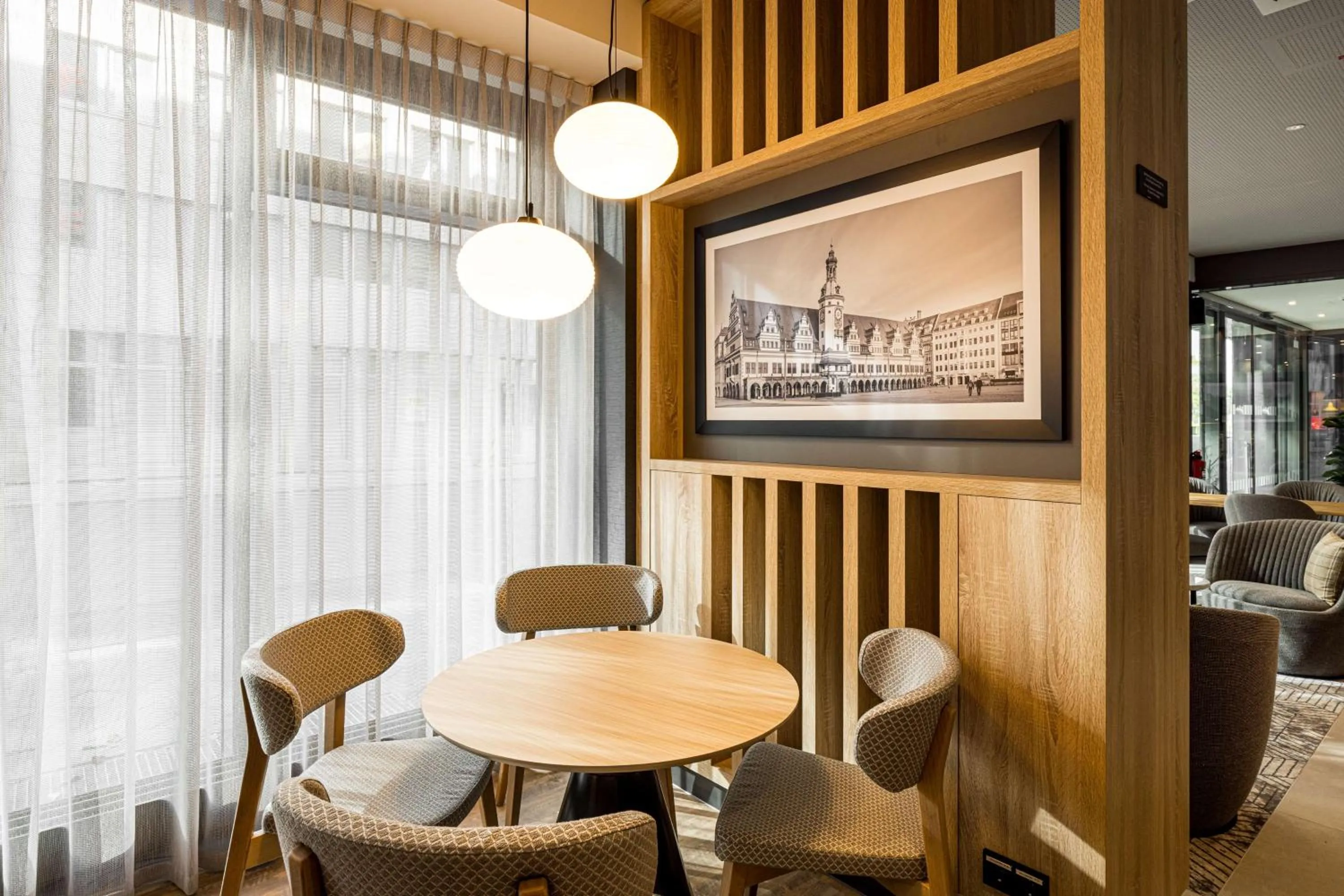 Lobby or reception in Radisson Hotel Leipzig