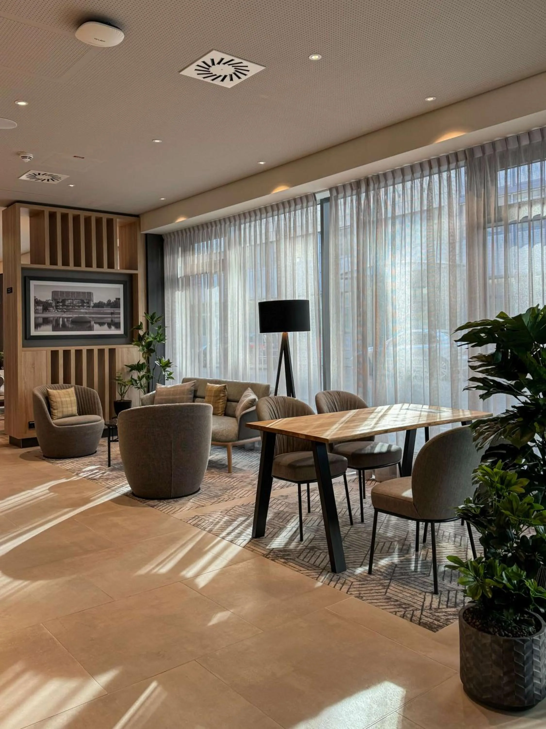 Lobby or reception in Radisson Hotel Leipzig