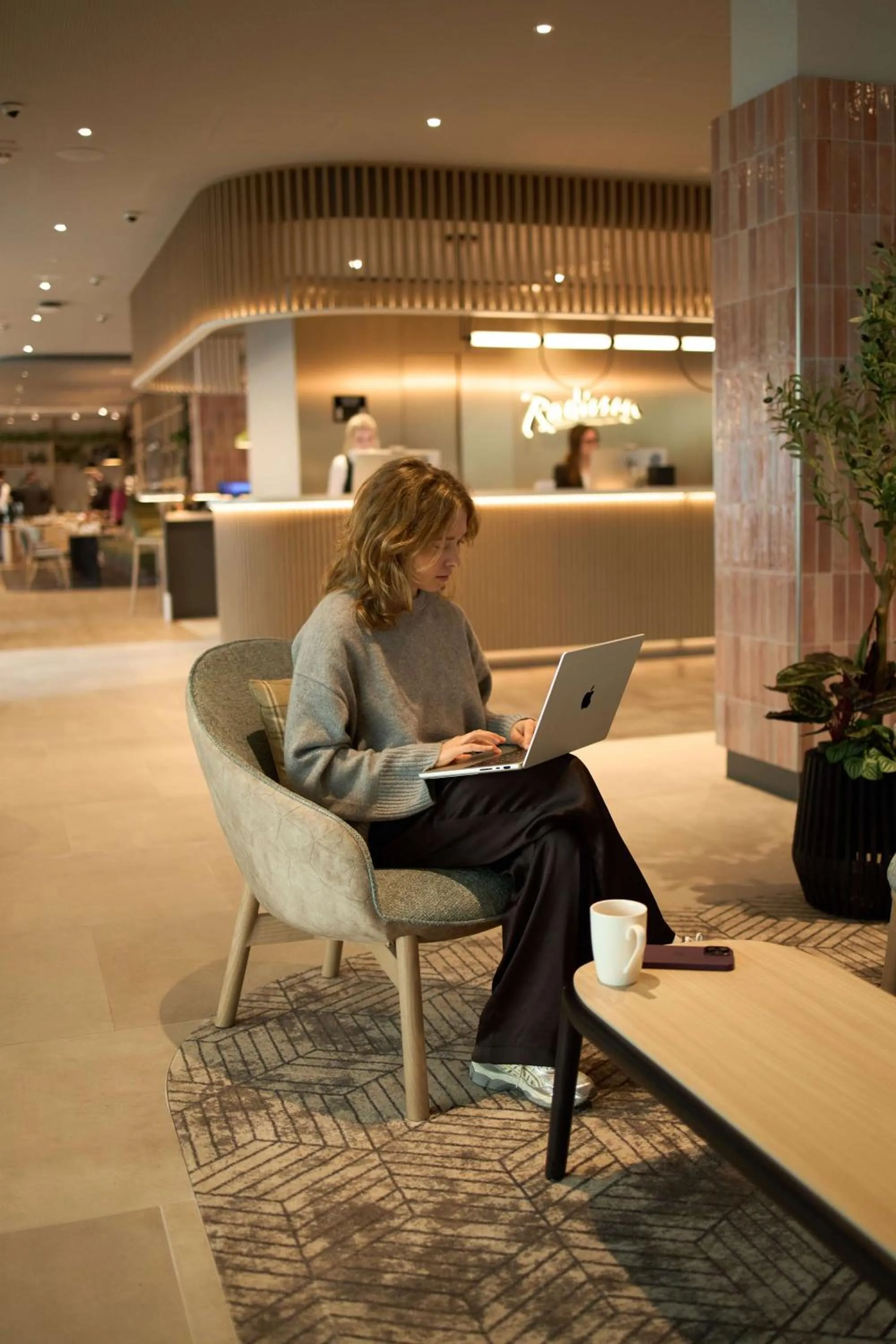 Lobby or reception in Radisson Hotel Leipzig