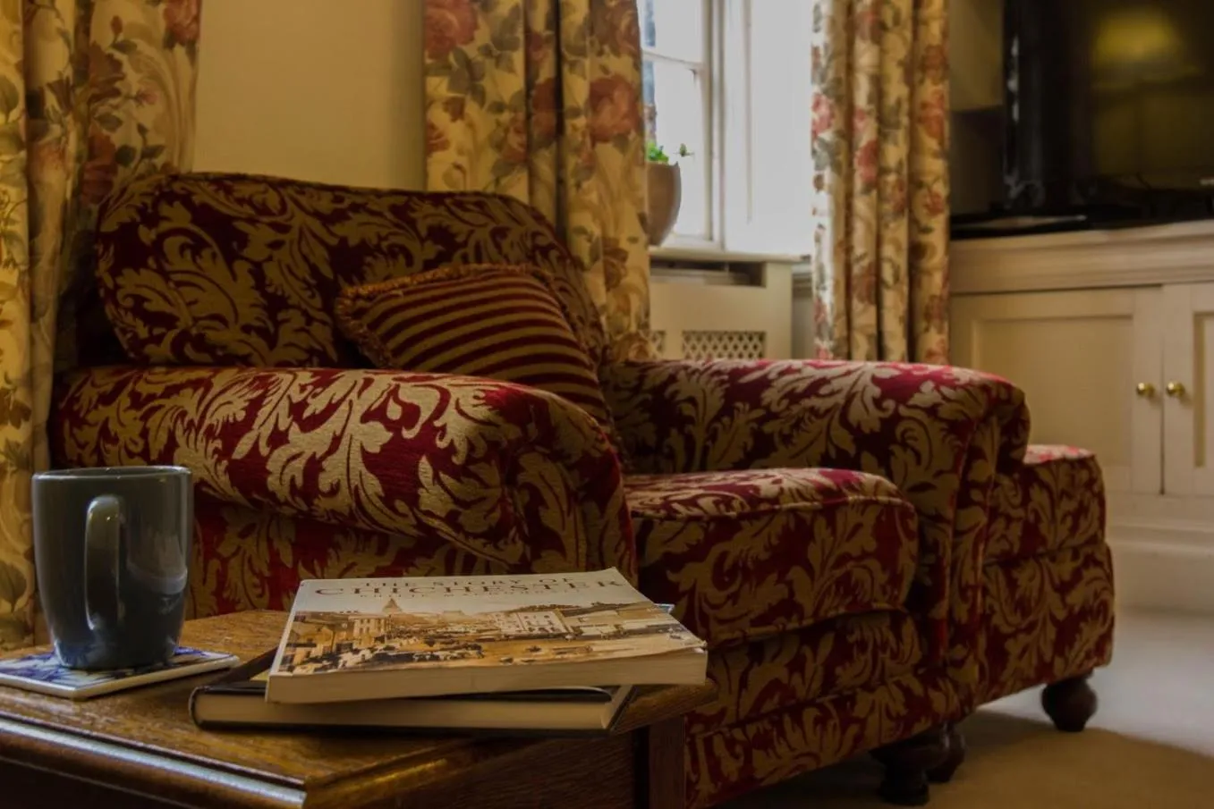 Communal lounge/ TV room in East Pallant Bed and Breakfast, Located in Large Georgian Townhouse in Central Chichester