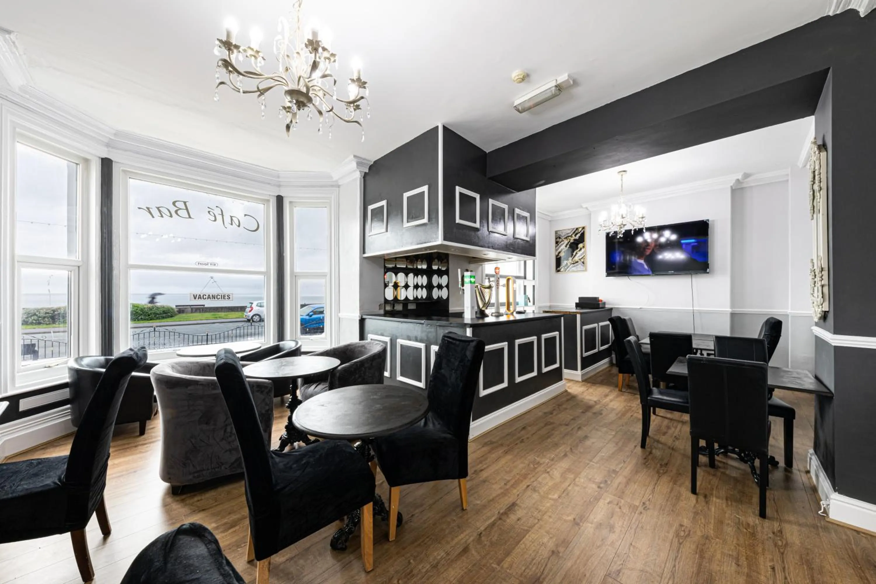 Communal lounge/ TV room in The Manor Hotel