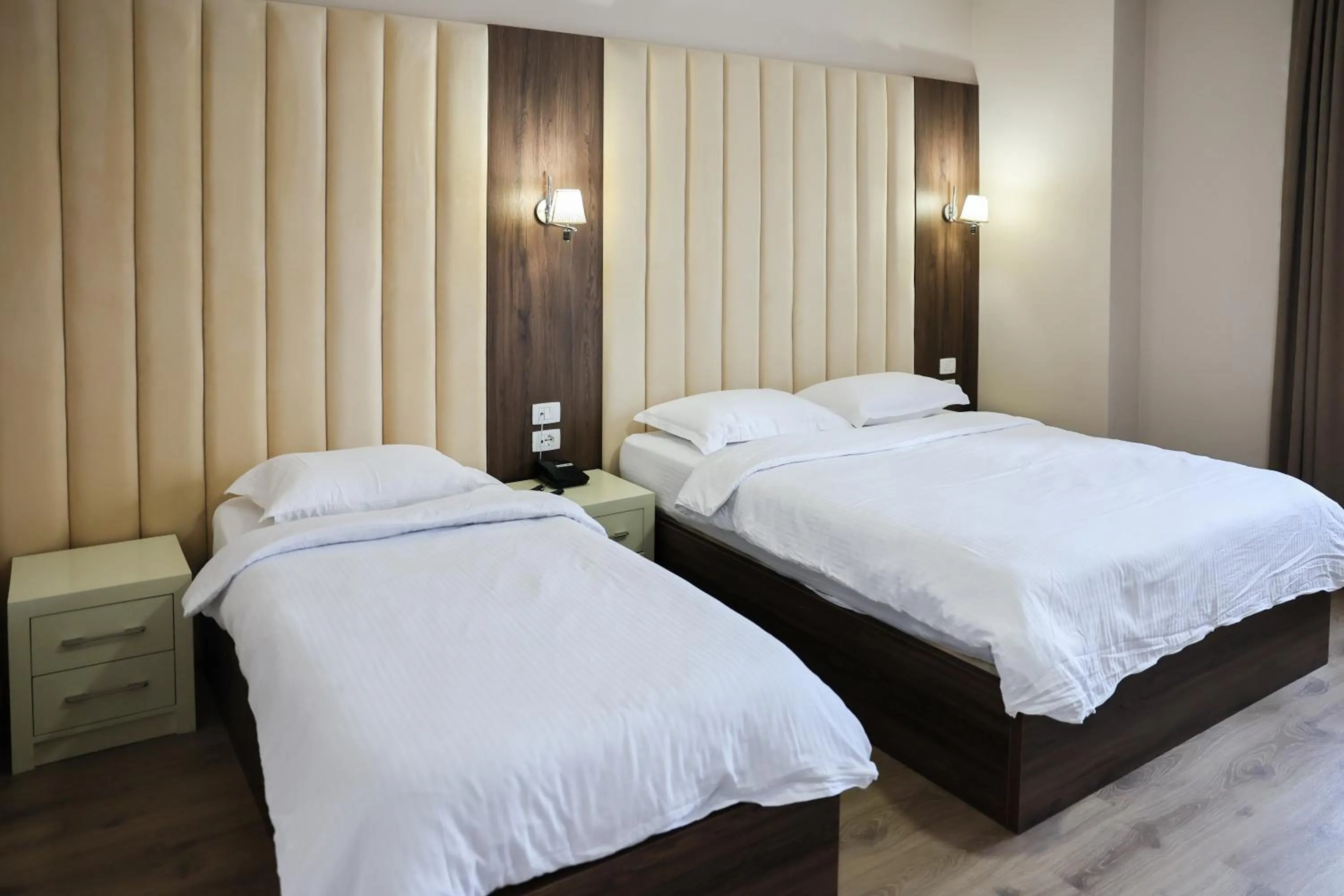 Bed in Gardenland Resort