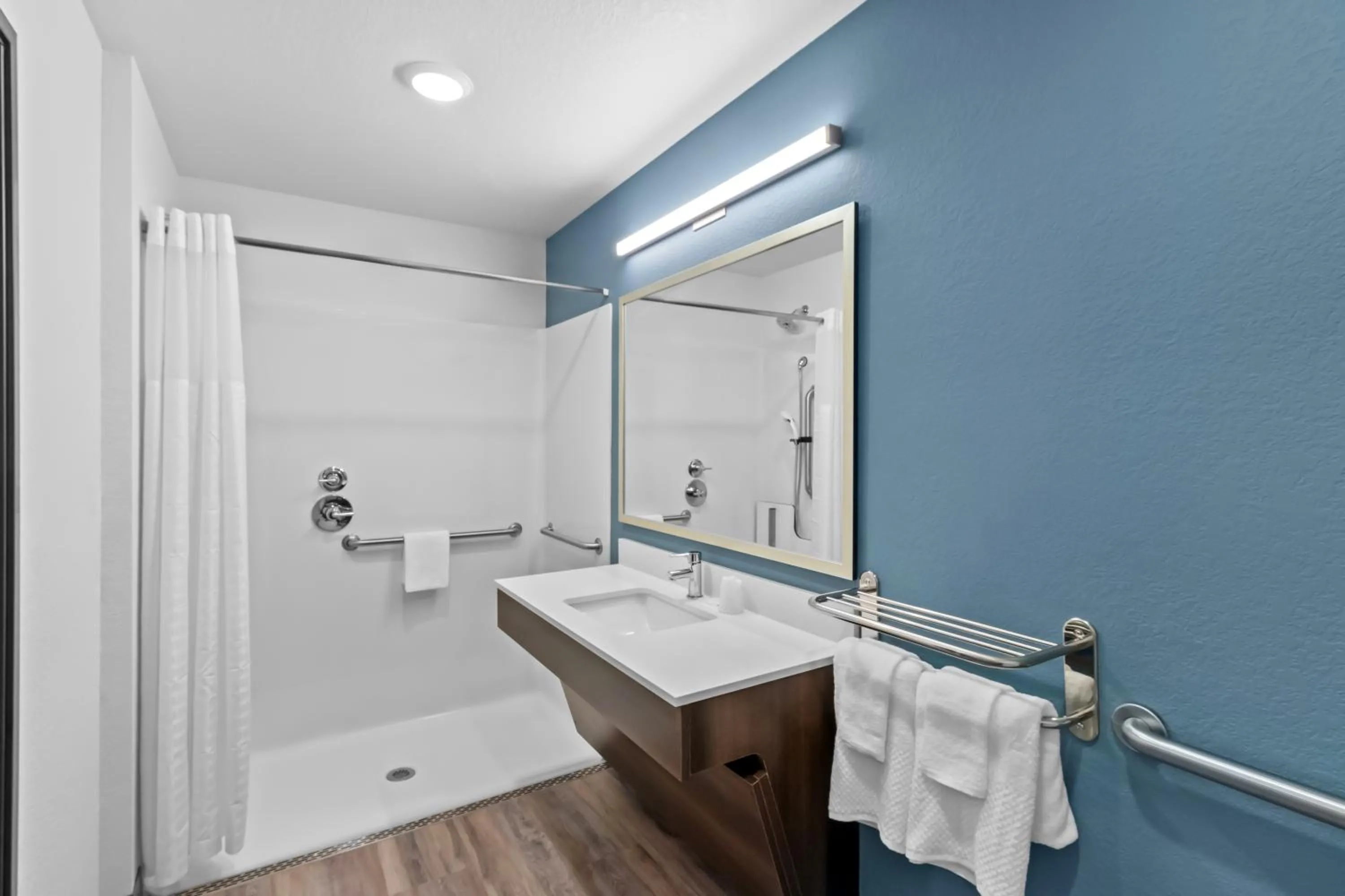 Bathroom in WoodSpring Suites Beaverton - Portland West