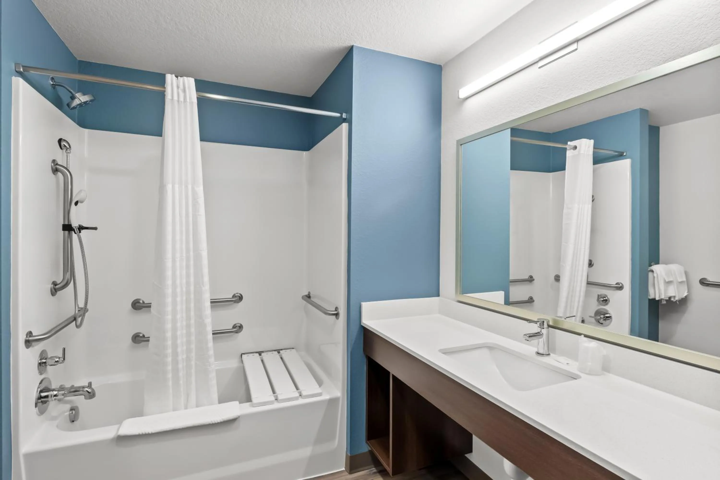 Bathroom in WoodSpring Suites Beaverton - Portland West