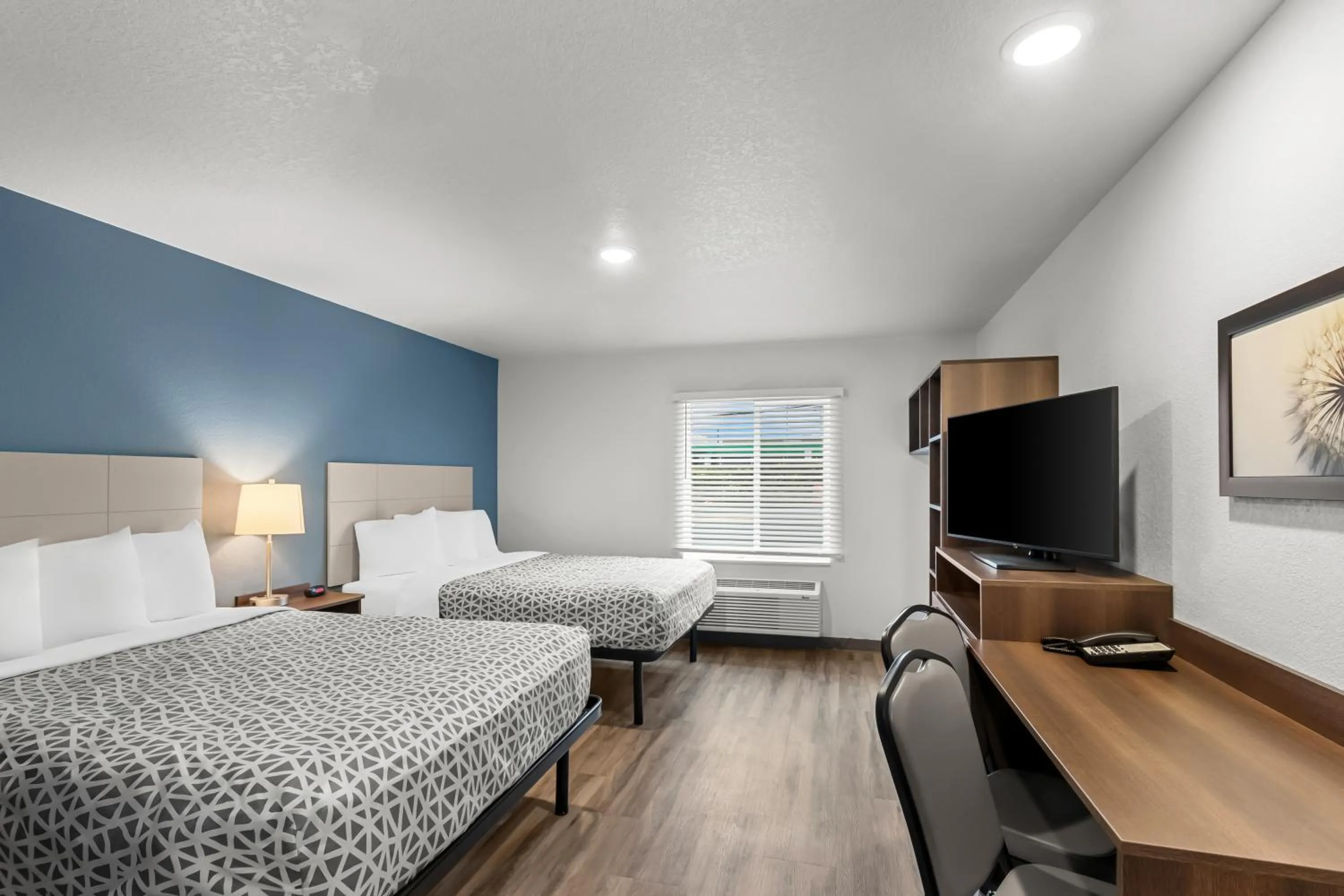 Bedroom, Bed in WoodSpring Suites Beaverton - Portland West