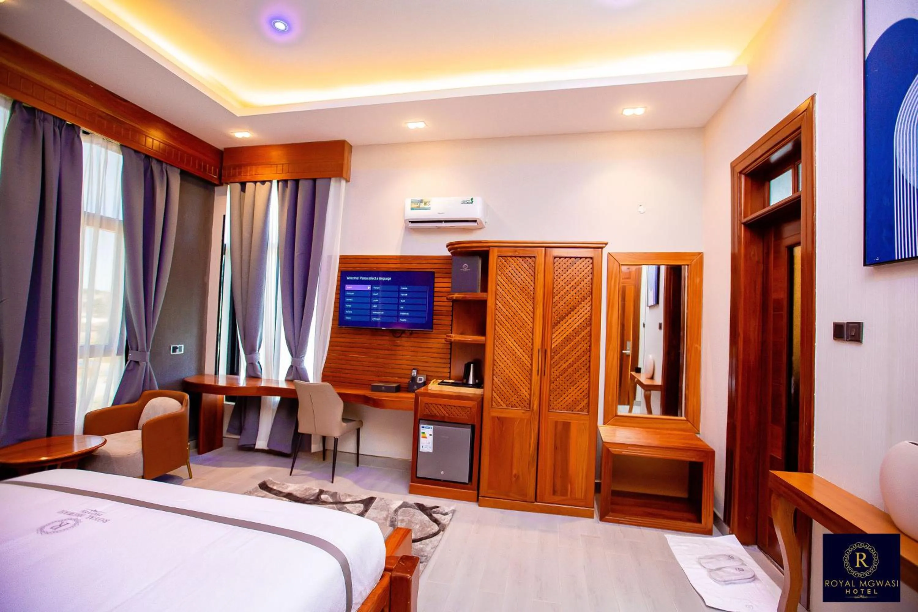 TV and multimedia, Bed in Royal Mgwasi Hotel