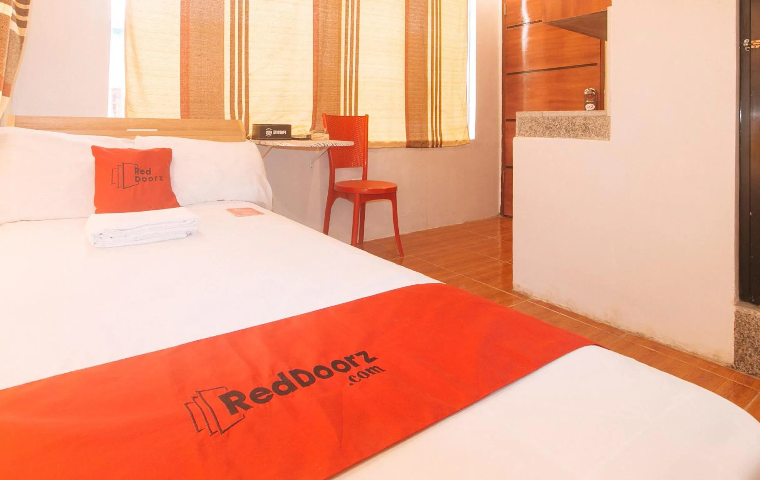 Bed in RedDoorz at Prince Hotel near NAIA T1