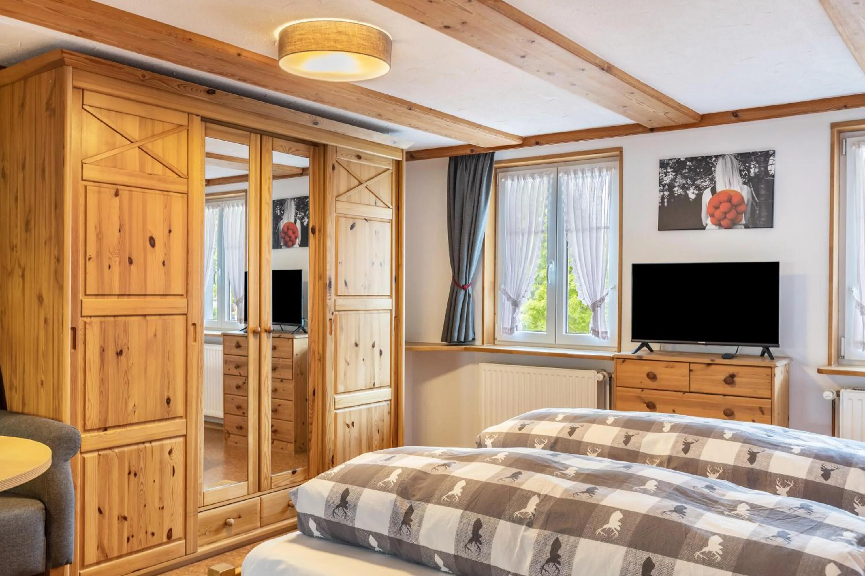 Living room, Bed in Pension Ferienwohnung Baarblick