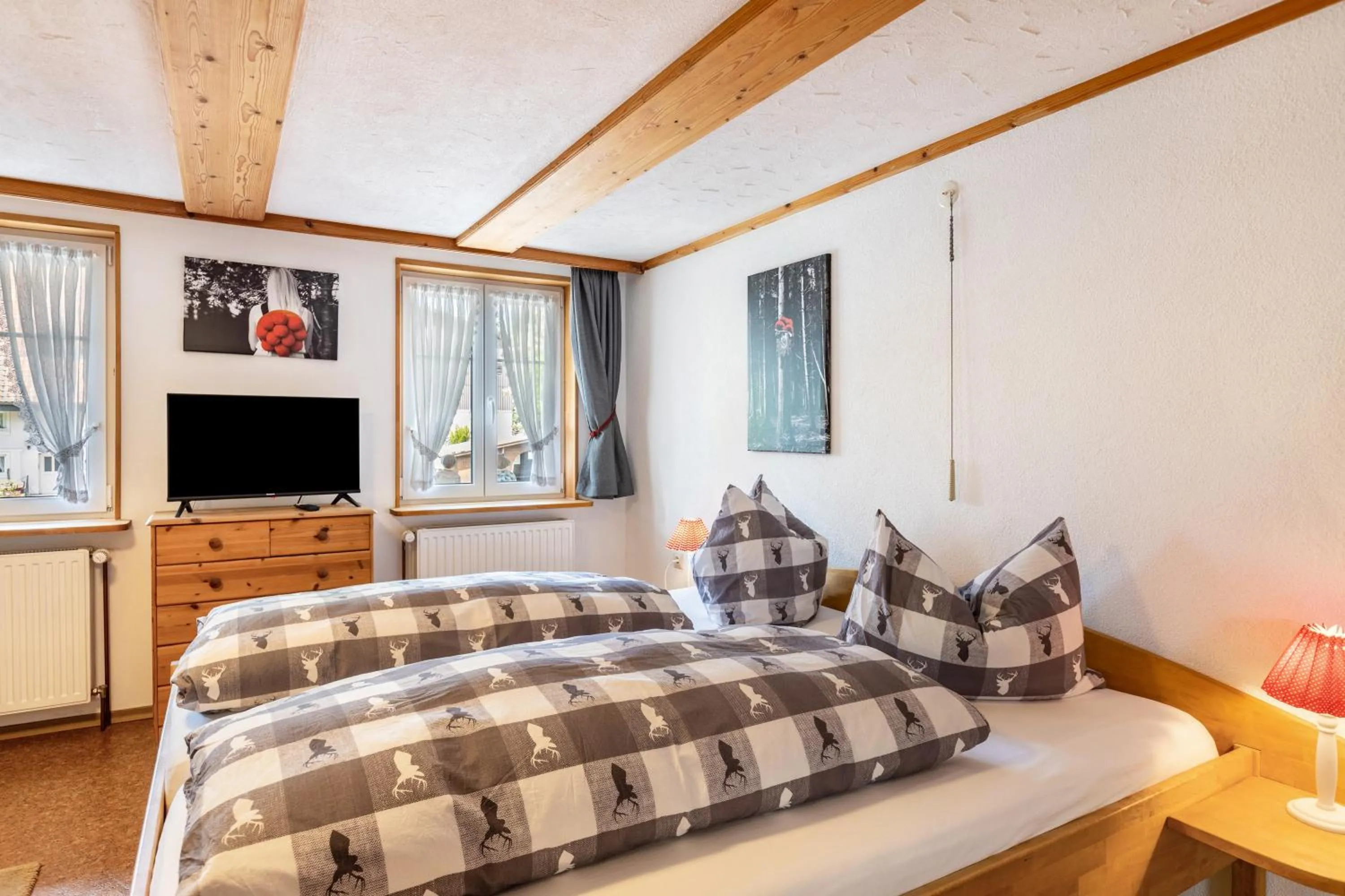 Living room, Bed in Pension Ferienwohnung Baarblick