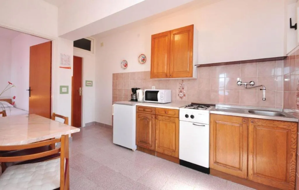 Kitchen or kitchenette in Apartments Coko