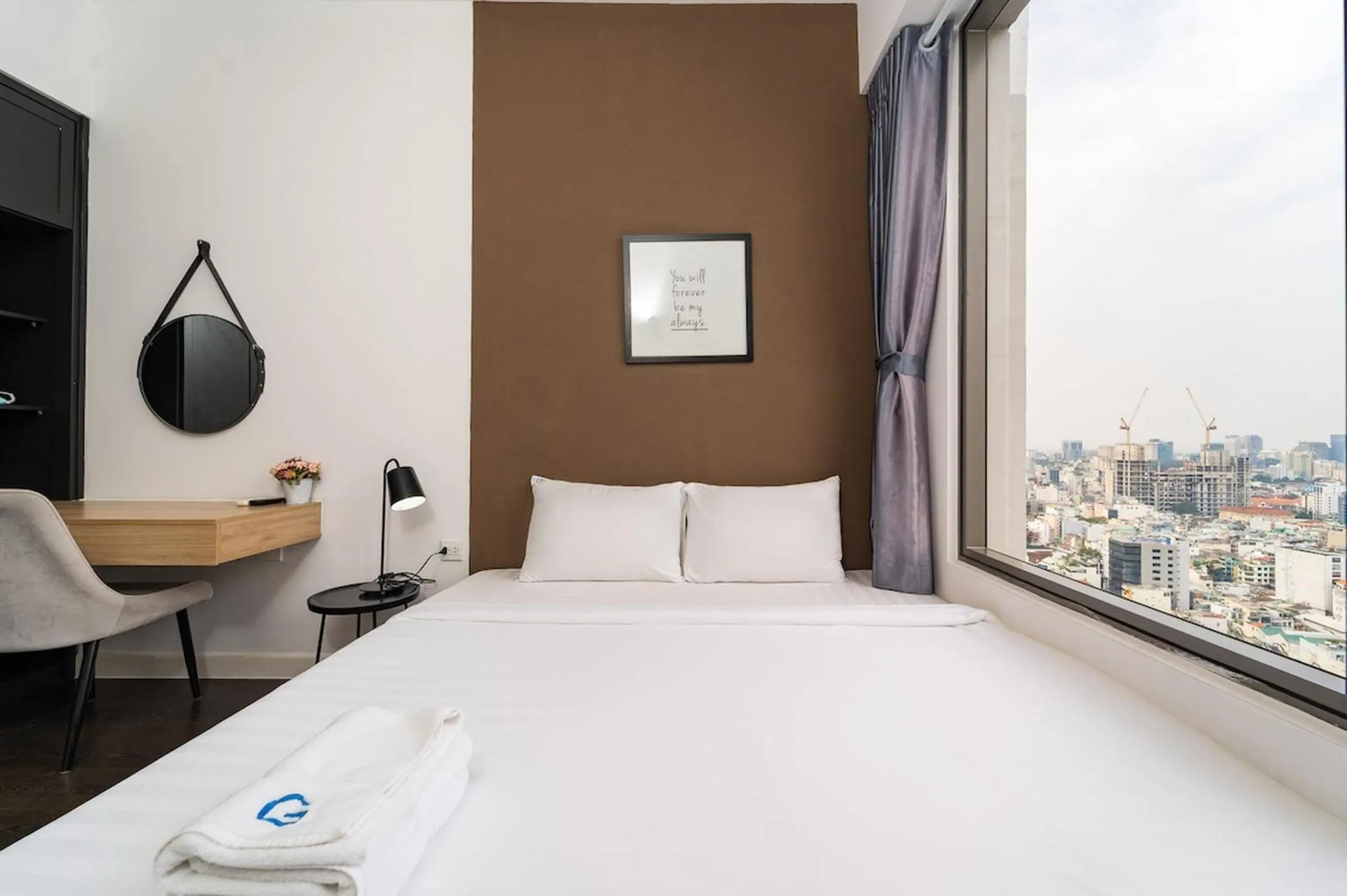 Bed in The RiverGate Apartments & Condo Saigon
