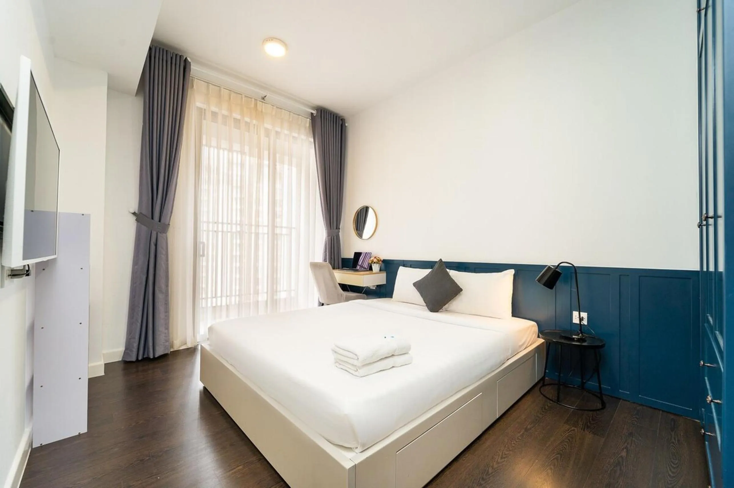 Bed in The RiverGate Apartments & Condo Saigon