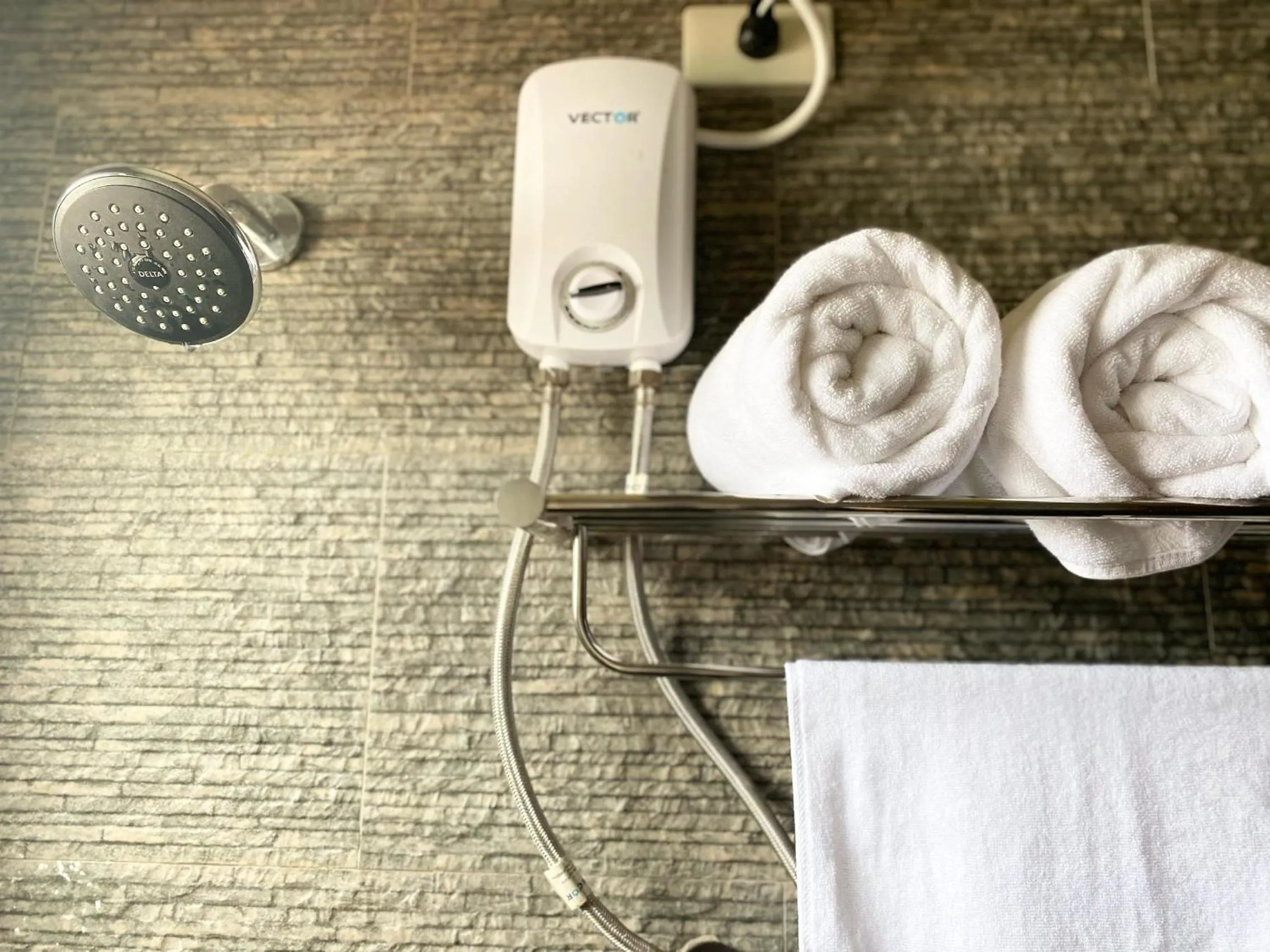 Shower in IAO Boutique Hotel