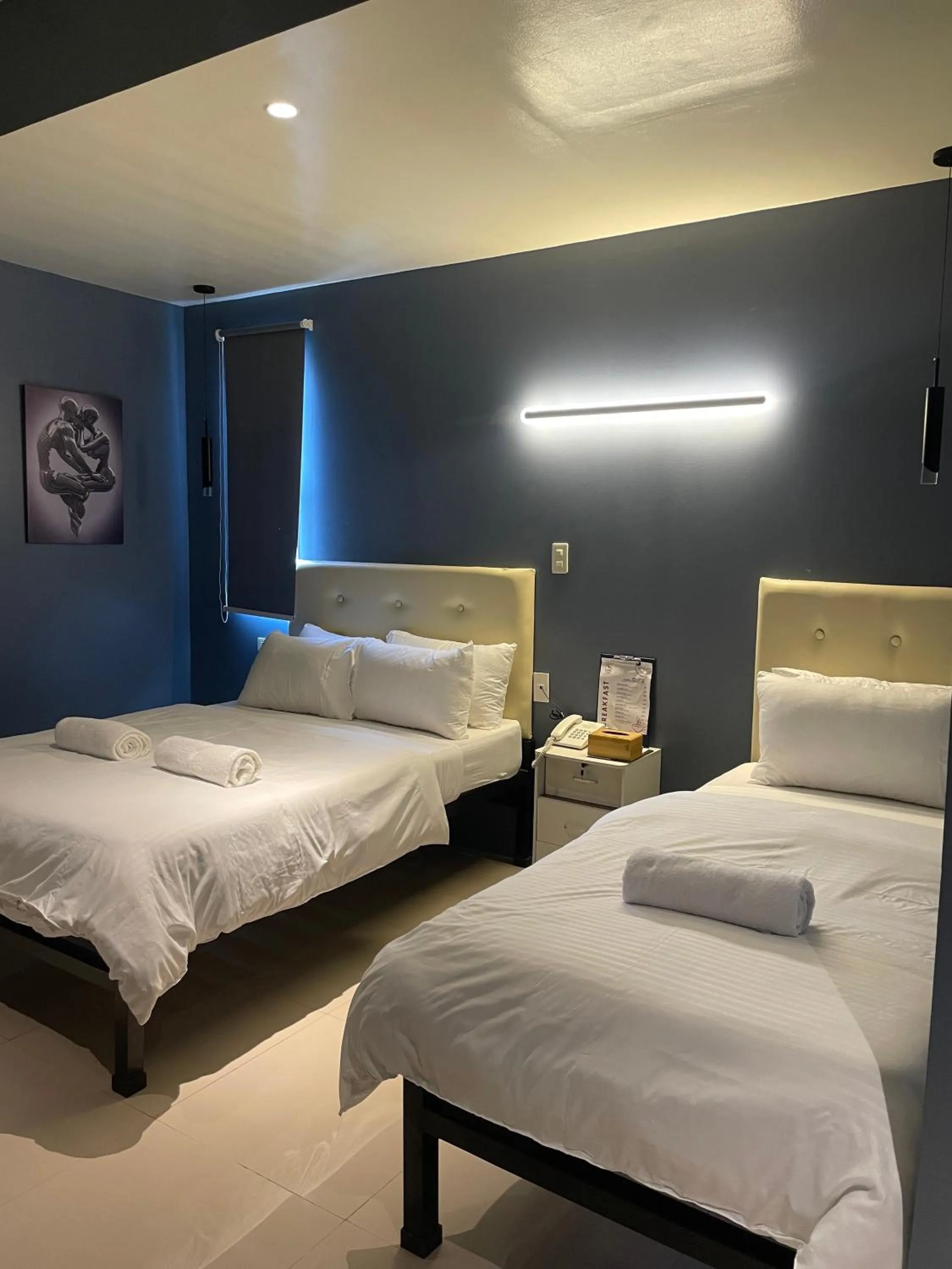 Bed in IAO Boutique Hotel