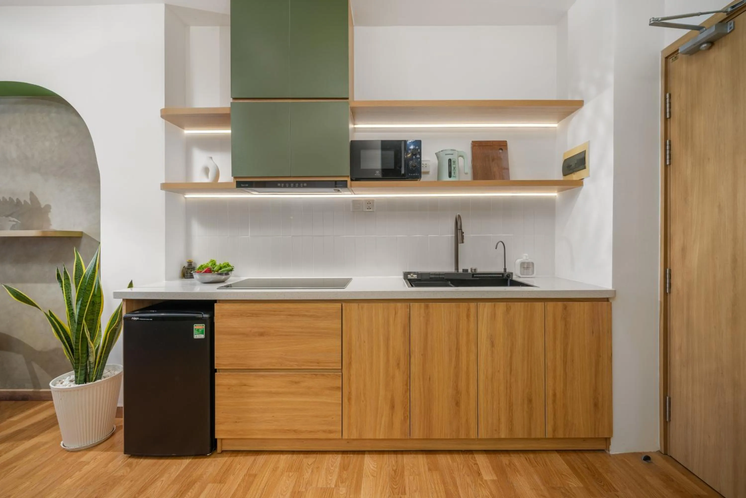 Kitchen or kitchenette in Q Apartment Da Nang