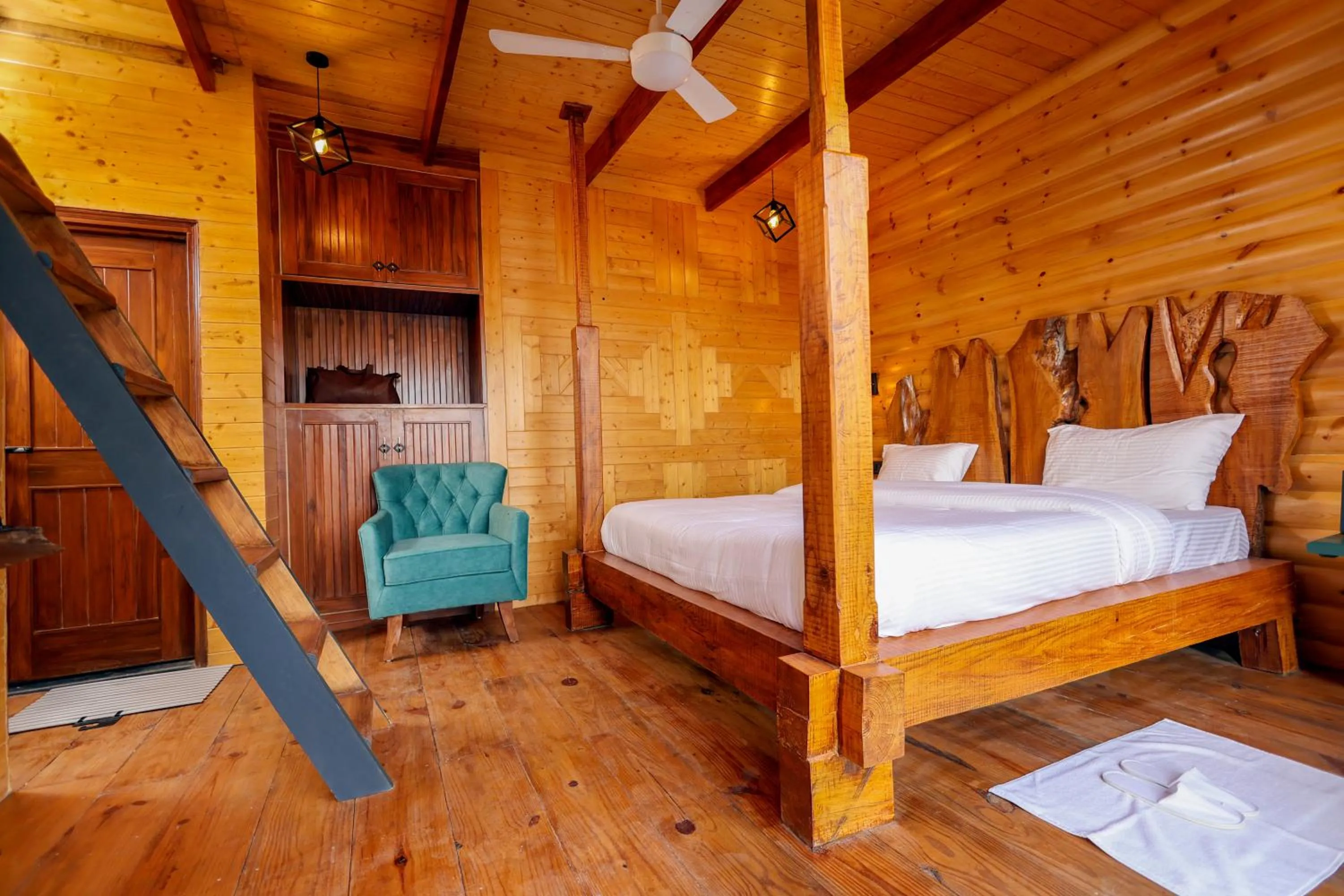 Bed in Koro Treehouse Resort Luxury Wooden Cottages and Villas with Private Pool