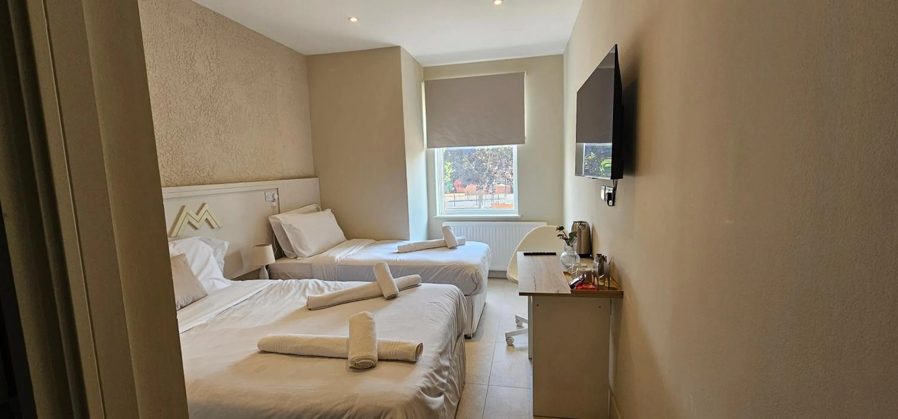 Bed in MSM Arena Hotel