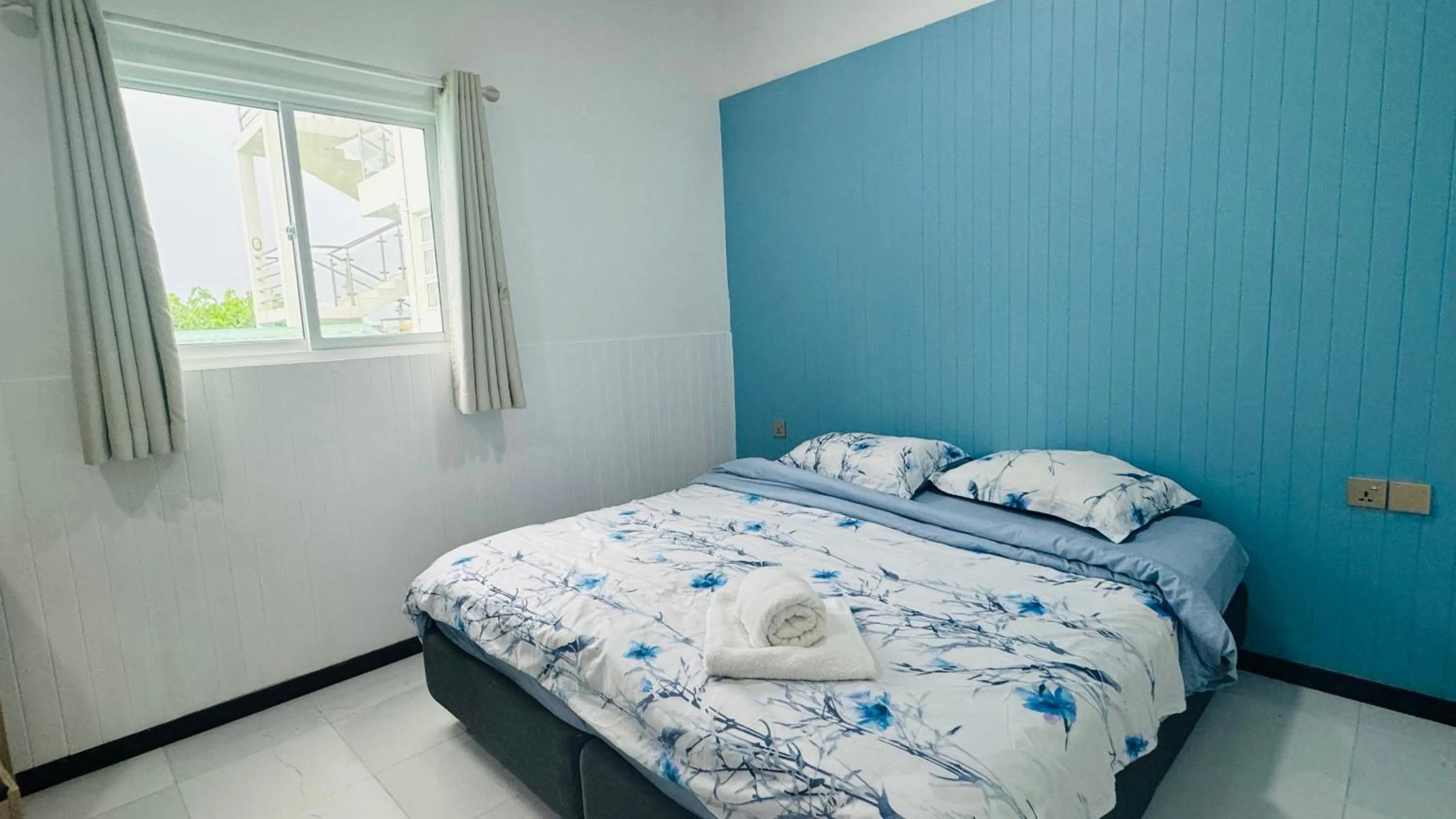 Bed in Wave Crest Retreat