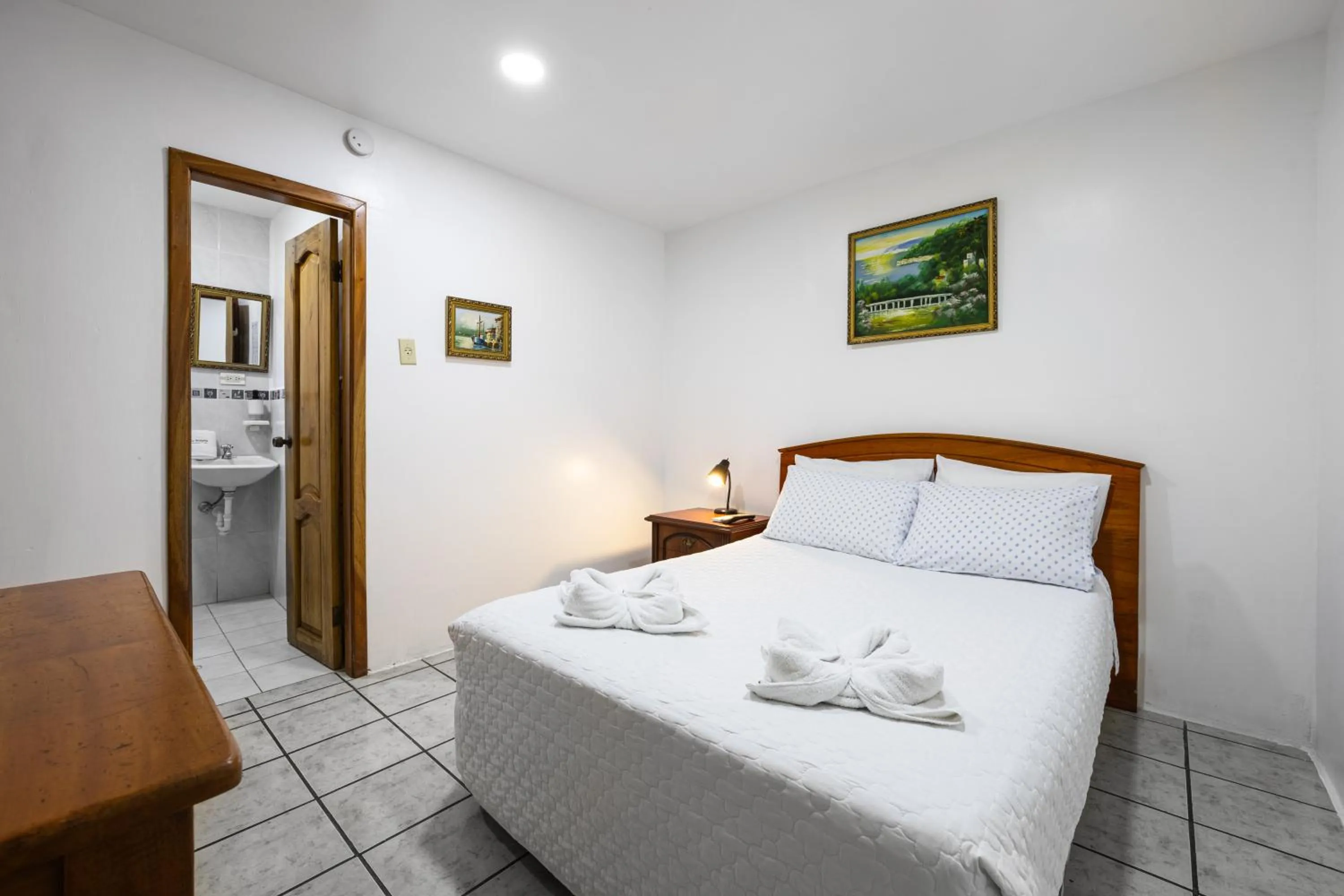 Bed in La Peregrina Galapagos B&B