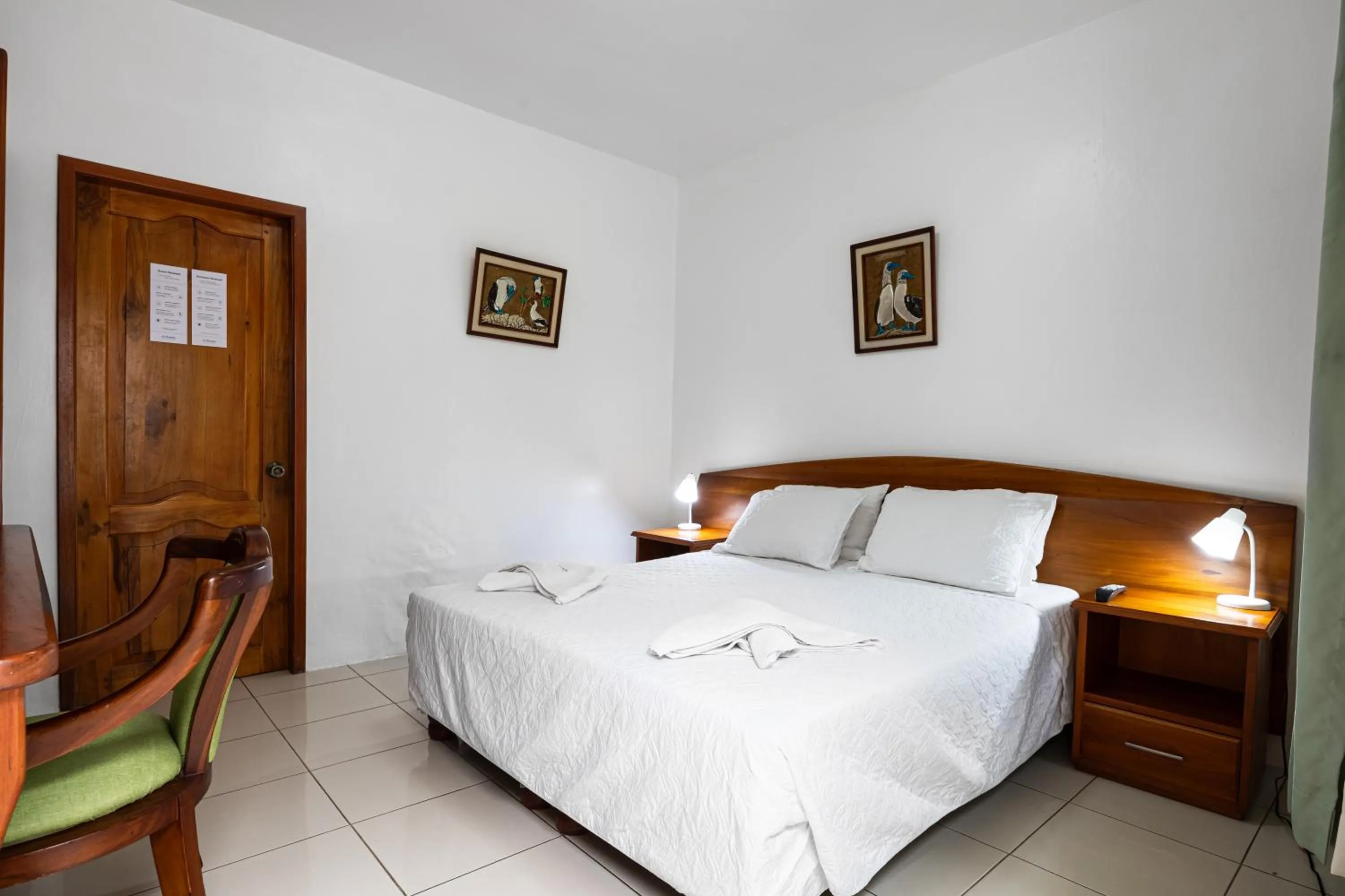 Bed in La Peregrina Galapagos B&B