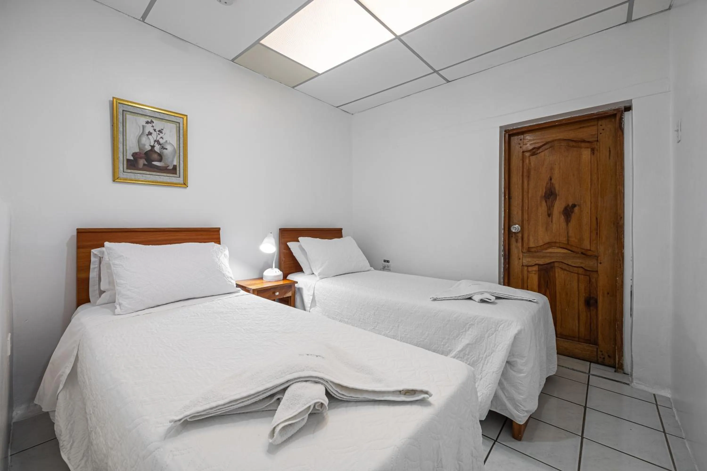 Bed in La Peregrina Galapagos B&B