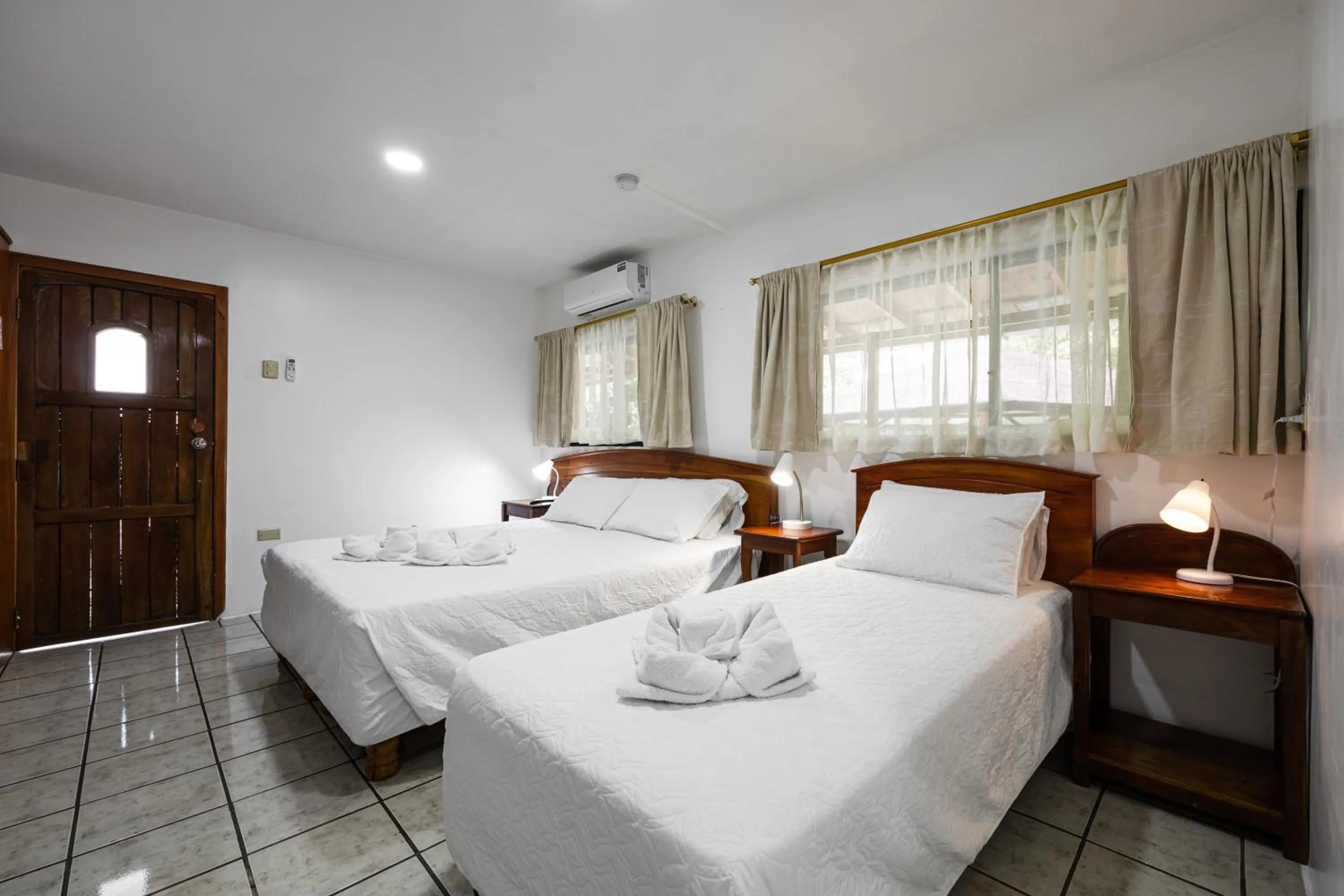 Bed in La Peregrina Galapagos B&B