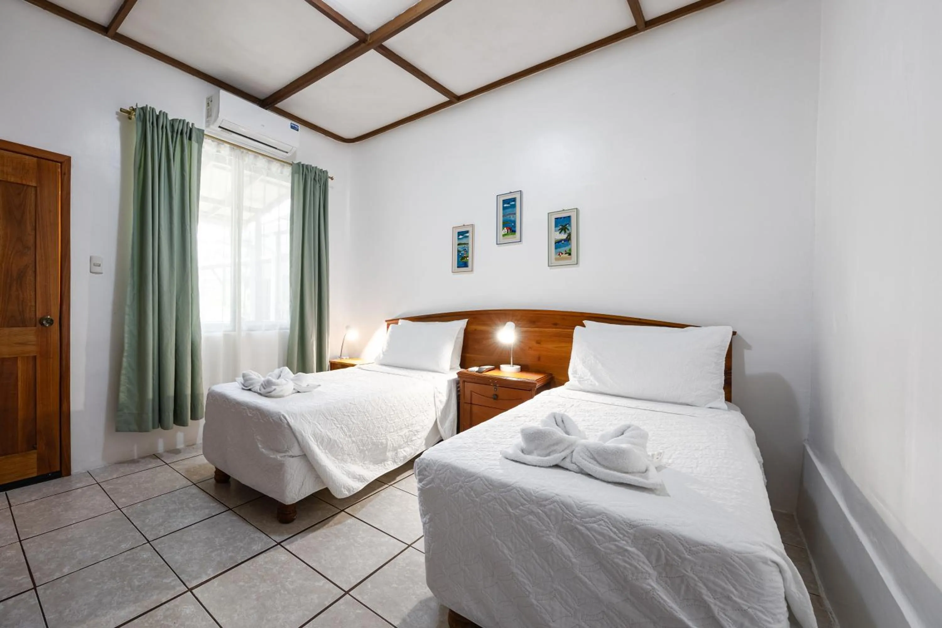 Bed in La Peregrina Galapagos B&B