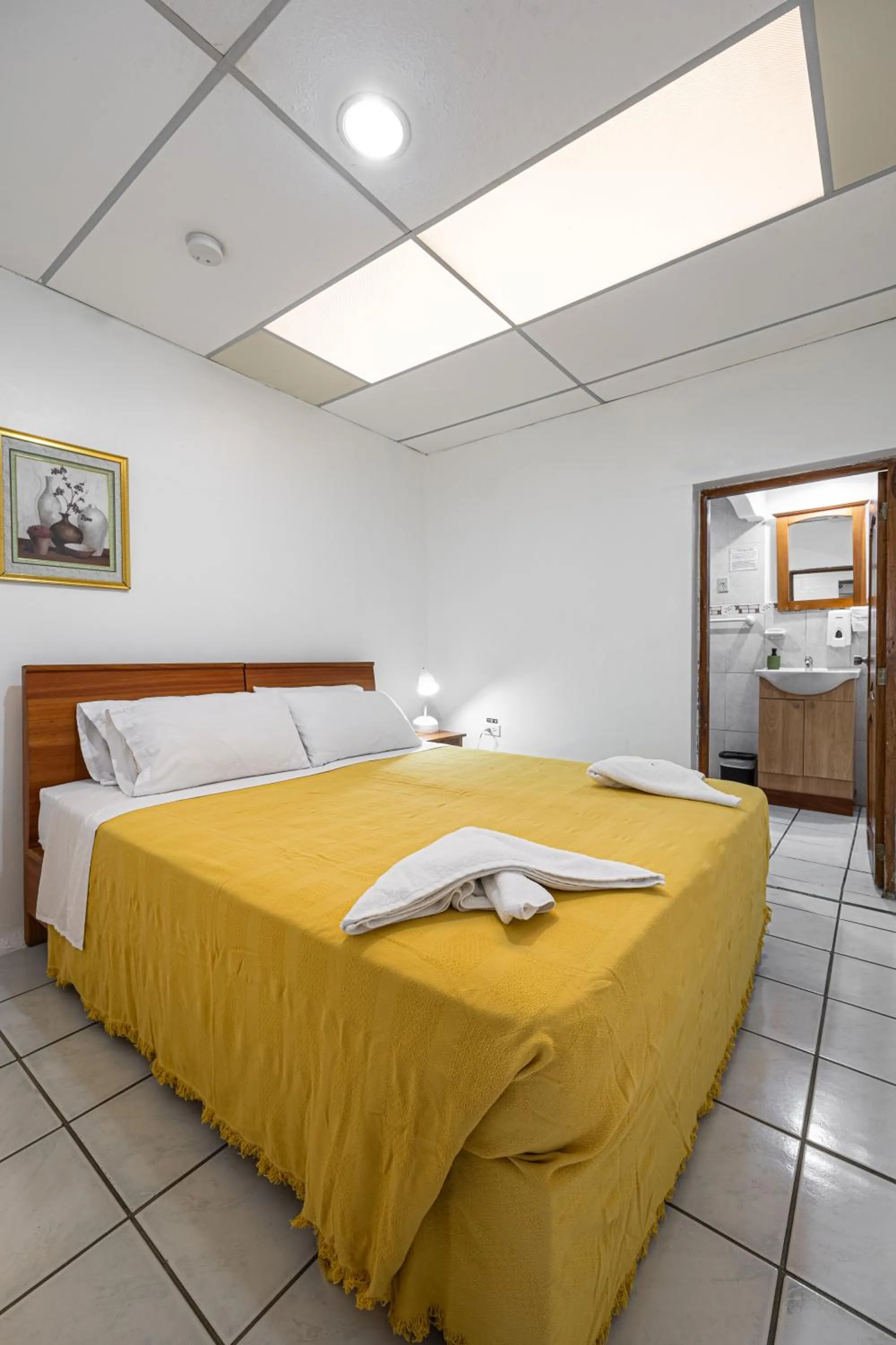 Bed in La Peregrina Galapagos B&B