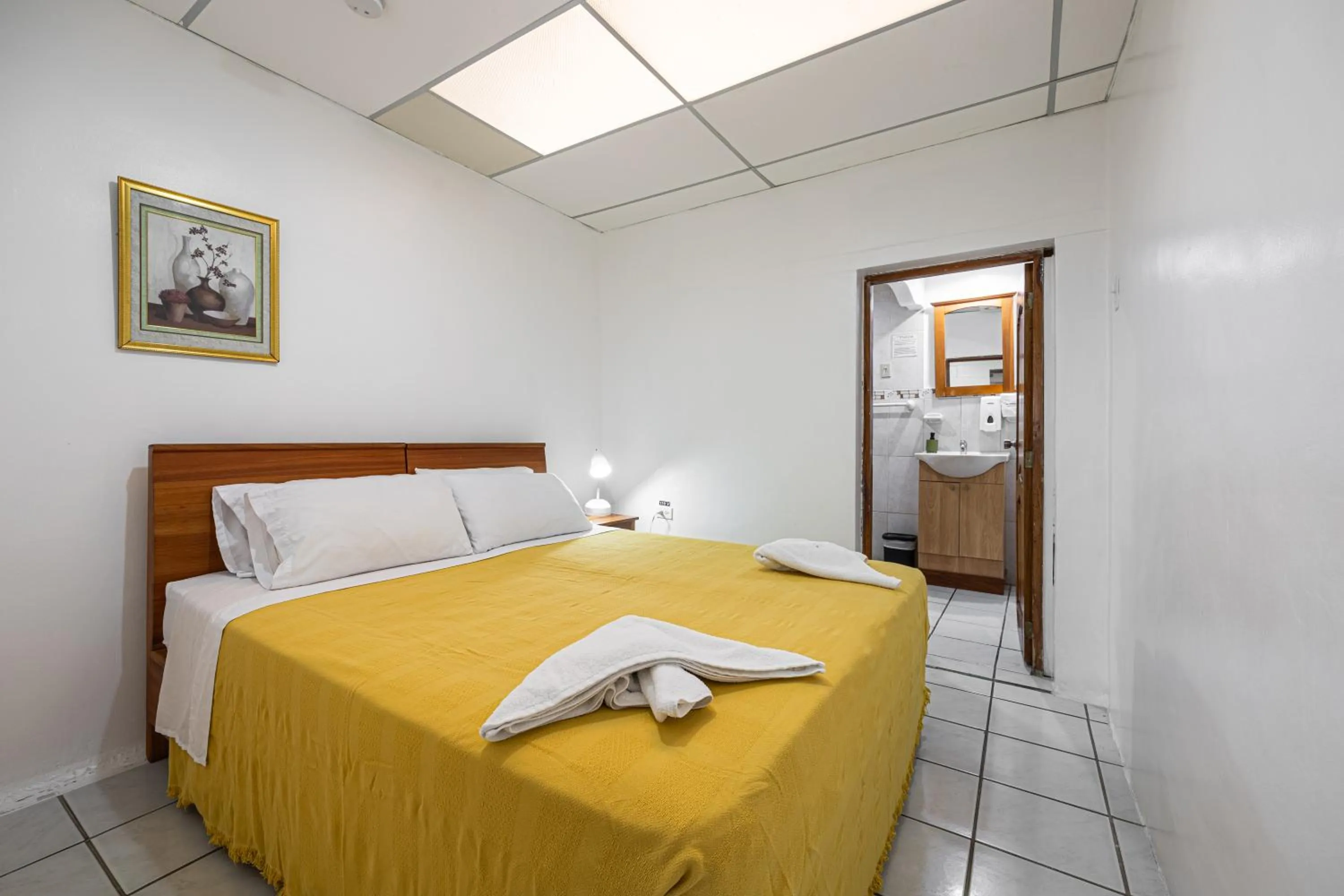 Bed in La Peregrina Galapagos B&B