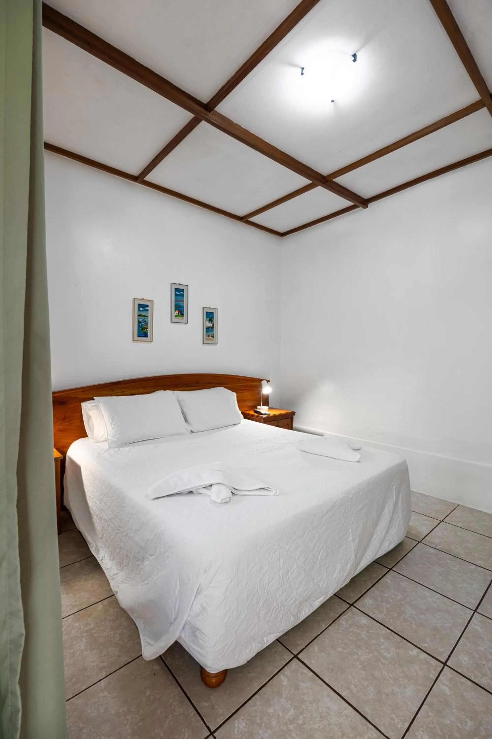 Bed in La Peregrina Galapagos B&B