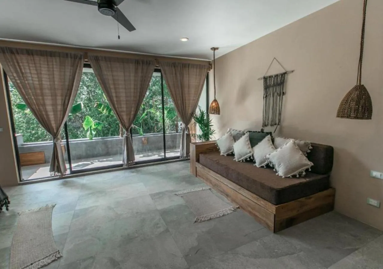 Living room, Bed in XscapeTulum