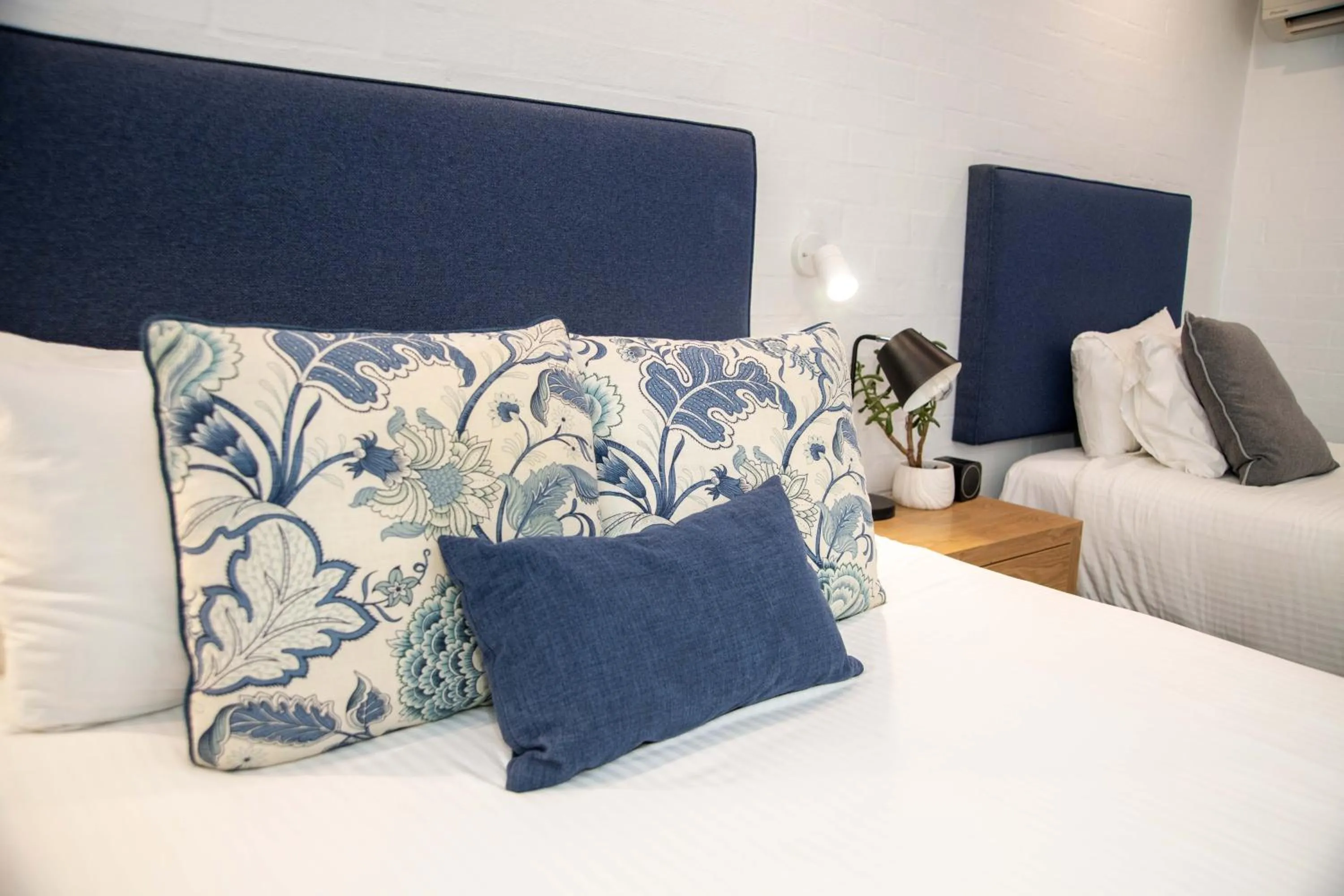 Bed in Town Square Motel