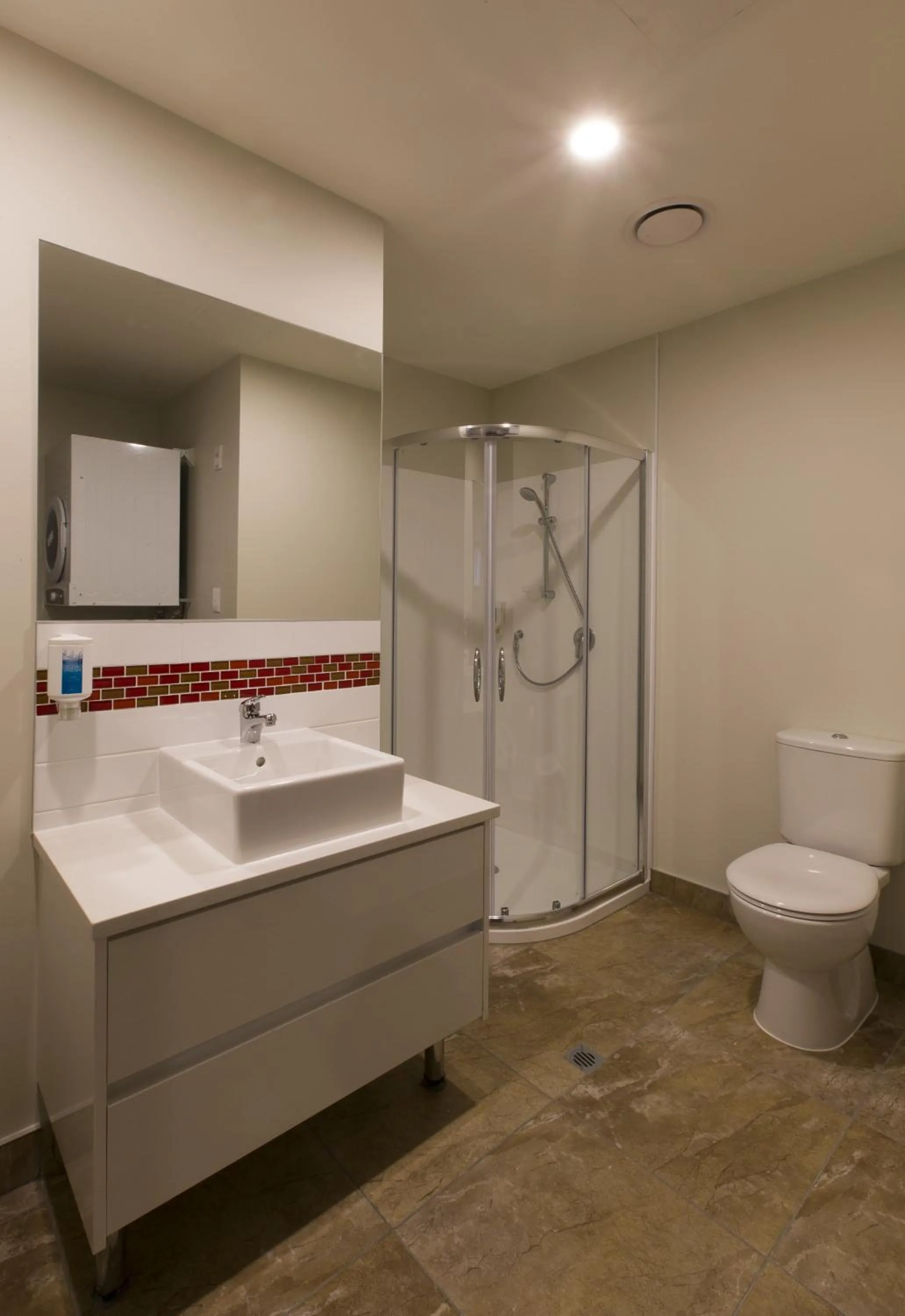 Shower in Ramada Suites by Wyndham Christchurch City