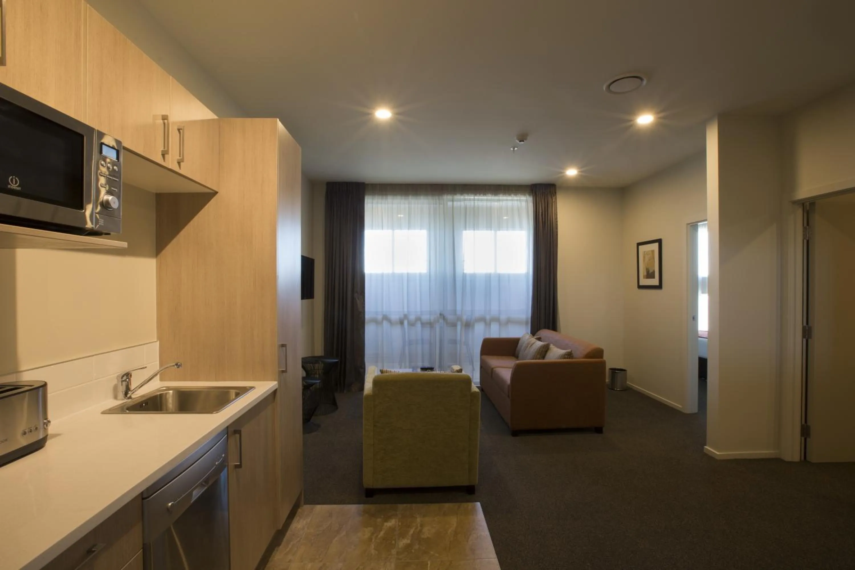 Living room in Ramada Suites by Wyndham Christchurch City