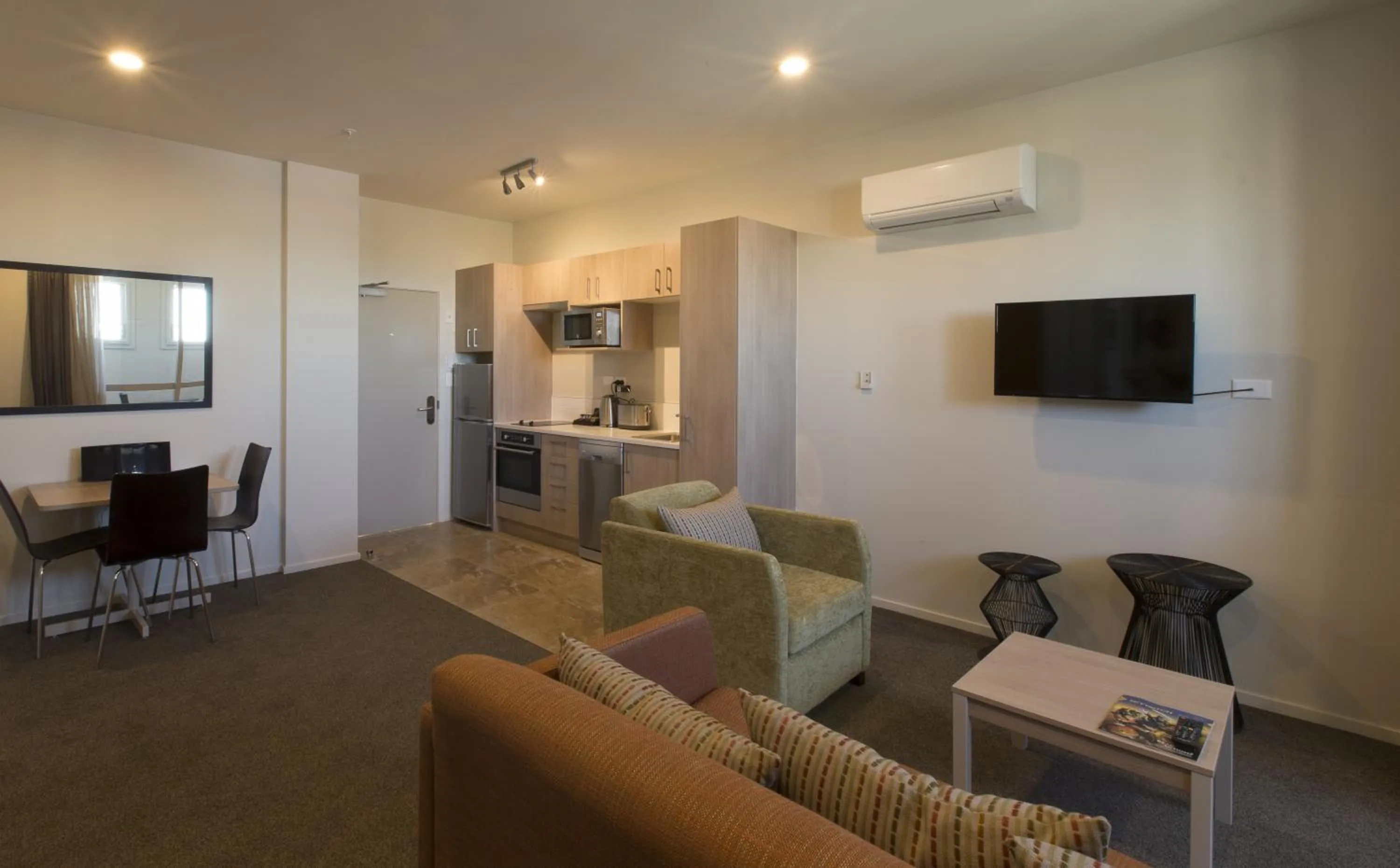 TV and multimedia in Ramada Suites by Wyndham Christchurch City