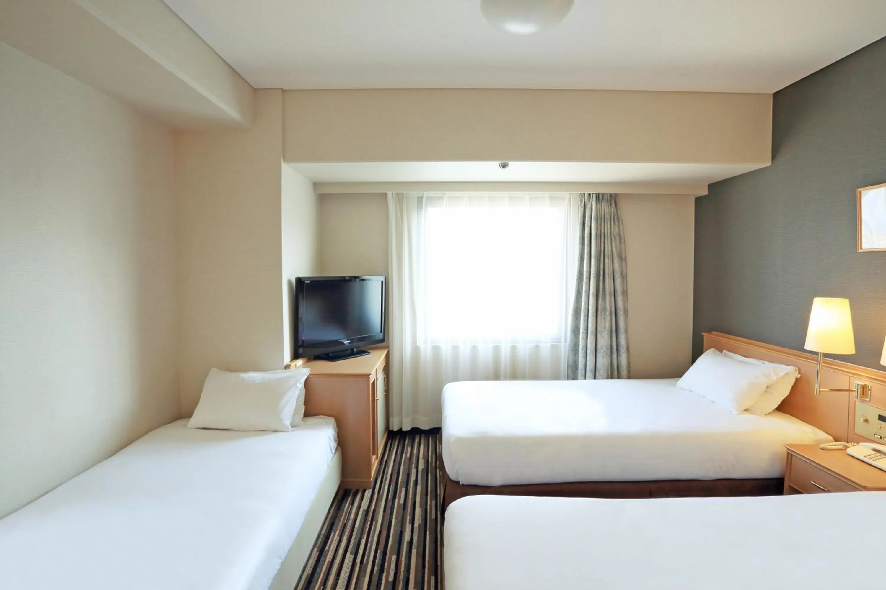 Photo of the whole room, Bed in Tokushima Tokyu Rei Hotel