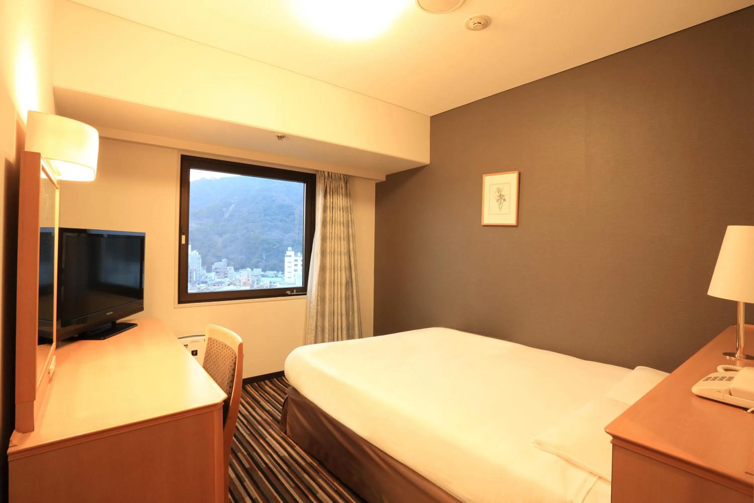 Photo of the whole room, Bed in Tokushima Tokyu Rei Hotel