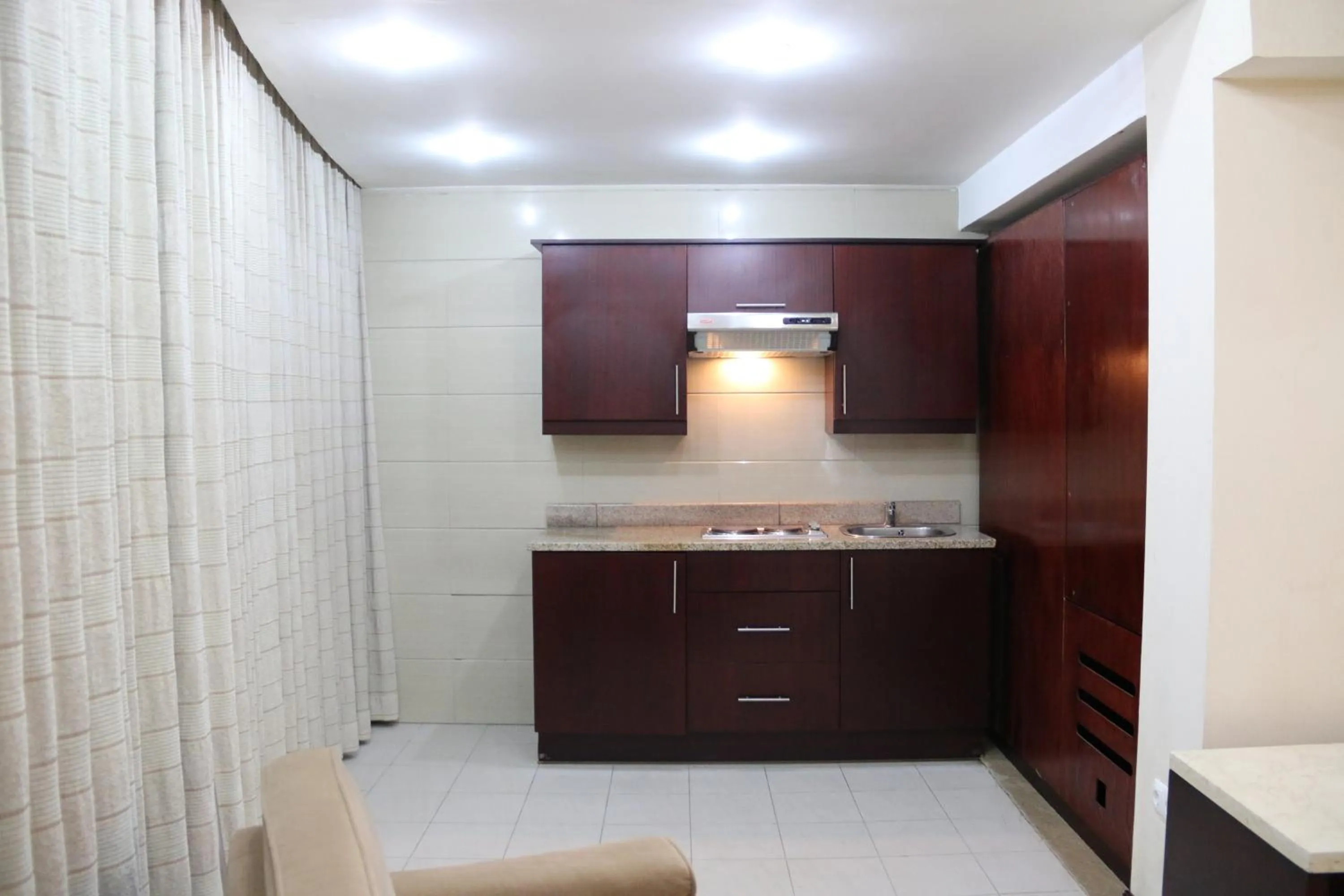 Kitchen or kitchenette in Harmony Hotel