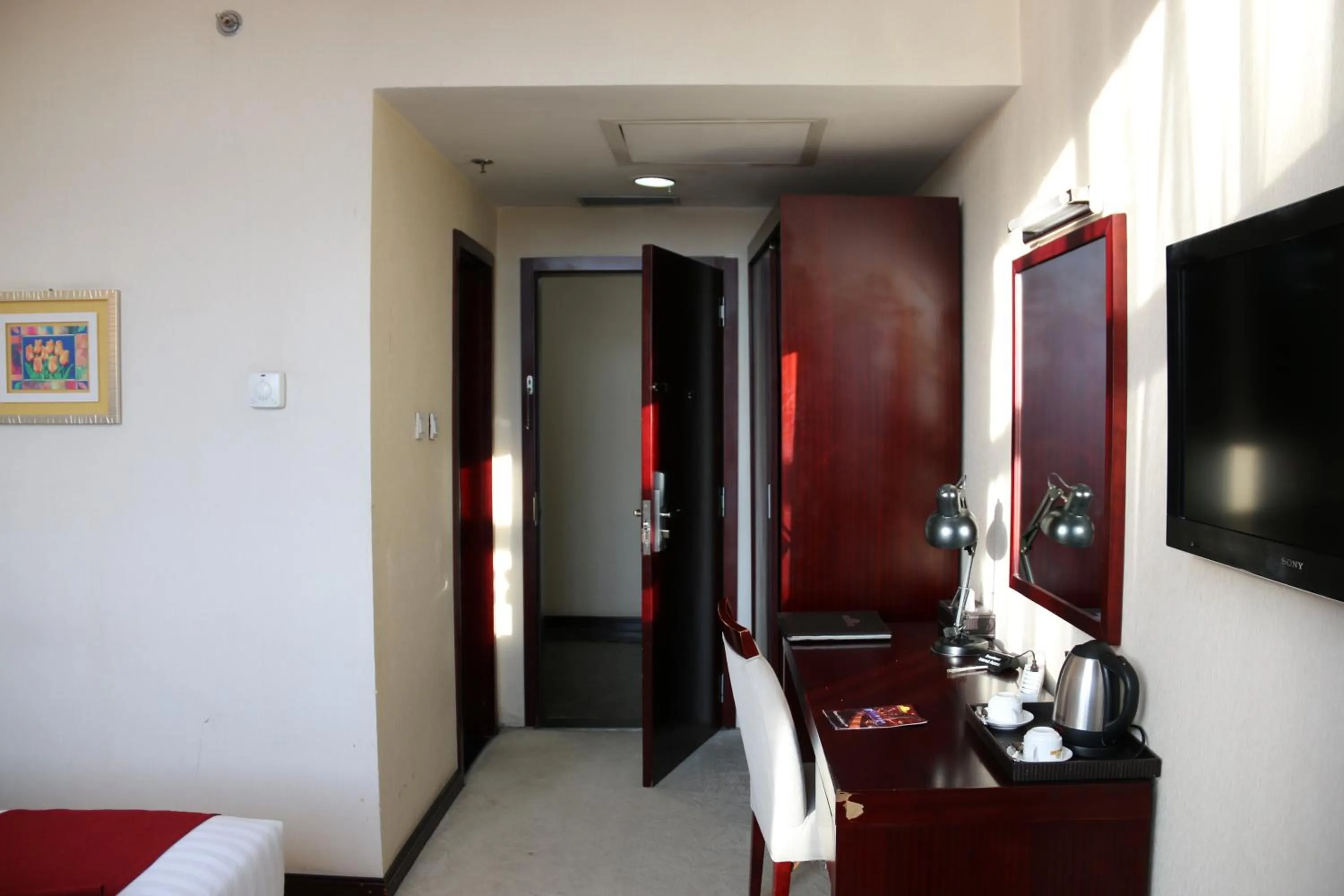 Coffee/tea facilities, Bed in Harmony Hotel