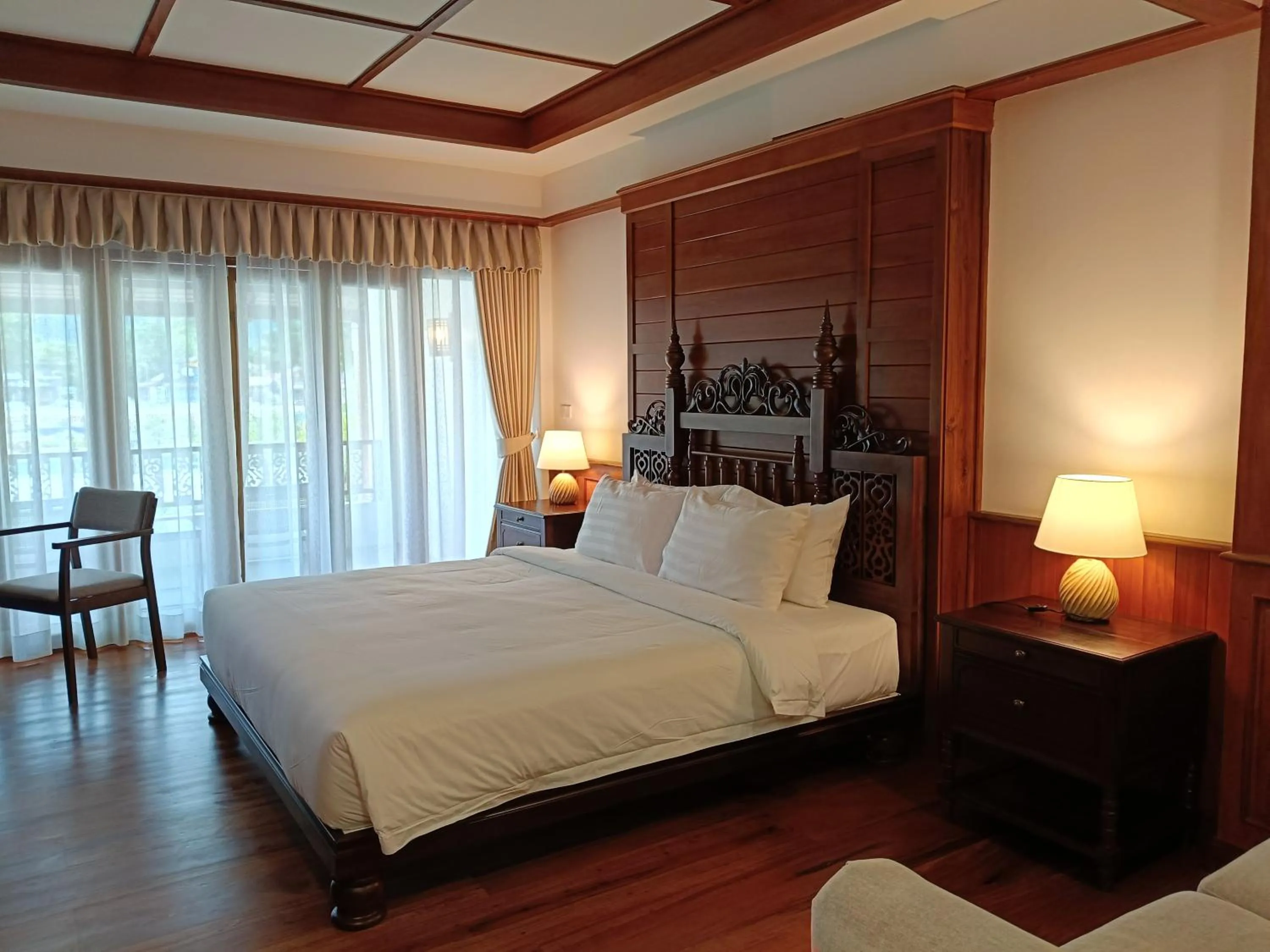 Bed in Phubarn VimarnVangvieng Resort