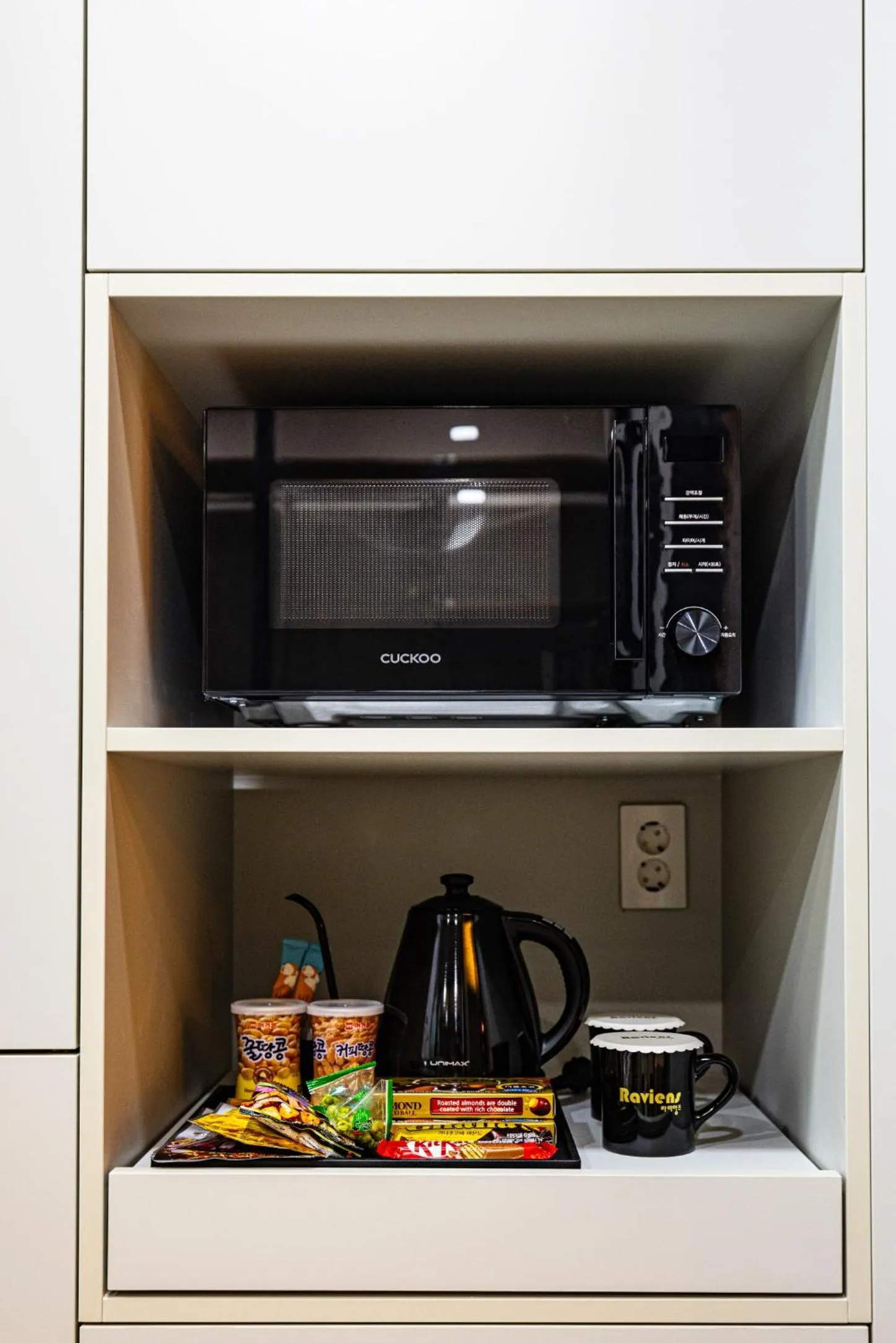 Kitchen or kitchenette in Raviens Haeundae Avenue